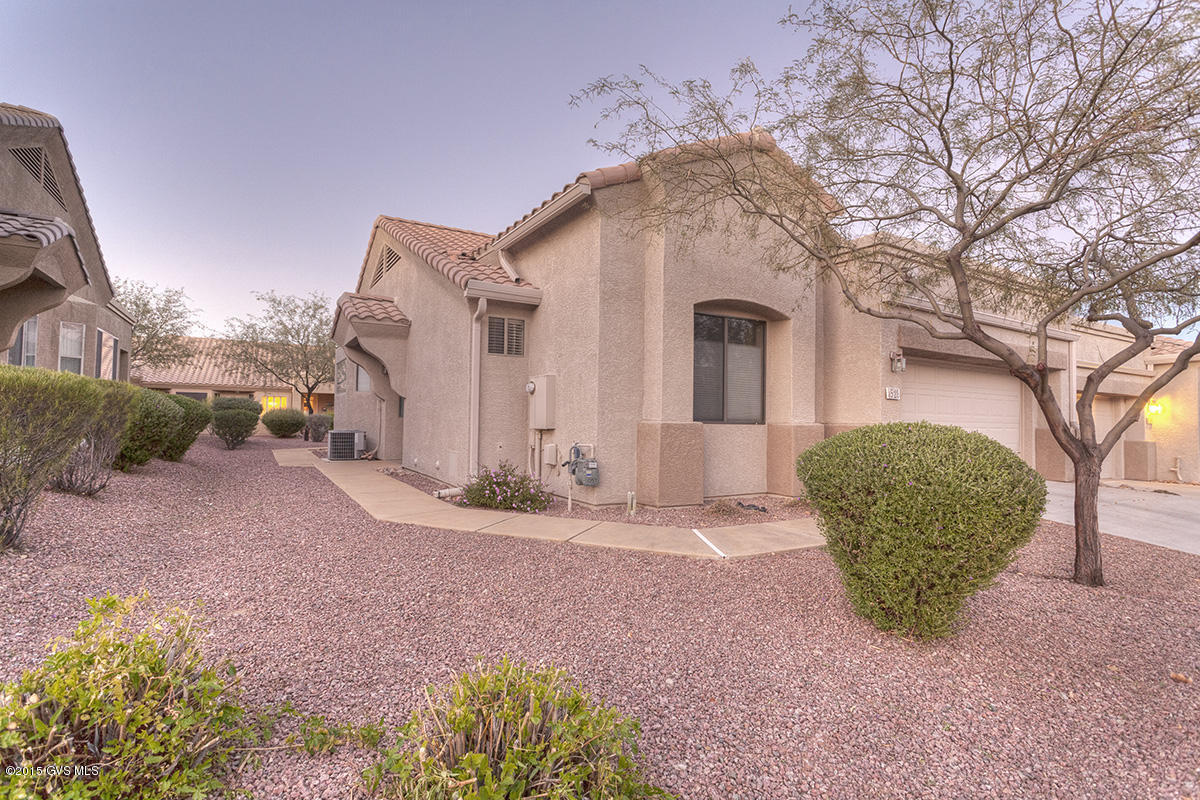 This is a one owner, pride of ownership townhome that has a desirable location with views of the community entrance with fountain and the Catalina Mountains beyond. This hidden gem appears larger than the 1282 Sq. Ft. thanks to the great room design and split Bedrooms. The entire home has tile floors. The Master Bedroom is huge. MBA has has been remodeled with tile counters, 2 raised bowl sinks and unique faucets. Also the shower has been tiled. Front guest Bedroom has a step in closet and the guest bath has been remodeled with a deep soaking tub w/ tiled surround and tiled vanity w/ glass bowl sink. The great room has a large bay window and surround sound. The kitchen has a tiled glass backsplash and pendant lighting over the breakfast bar. Off the light bright dining area is  the.... covered patio and extended open patio for sunbathing. Open views of the common area out back give sense of space. The 2 car garage is equipped with soft water, a utility tub and plenty of storage cabinet all on a coated garage floor. The home is also equipped with nice ceiling fans and Hunter Douglas cellular shades. This is the best priced home in the community.|\n|The one of a kind HOA is set up much like a condo but w/ fee simple title. They maintain your landscaping, stucco, paint and roof. Also the water for your landscaping; monthly pest control; expanded basic cable TV; trash and recyclable pickup; fire, hazard and liability insurance; all common areas, gates and road upkeep; reserve fund. Roads have been resurfaced. Roofs have all been recoated. Exterior Painting of