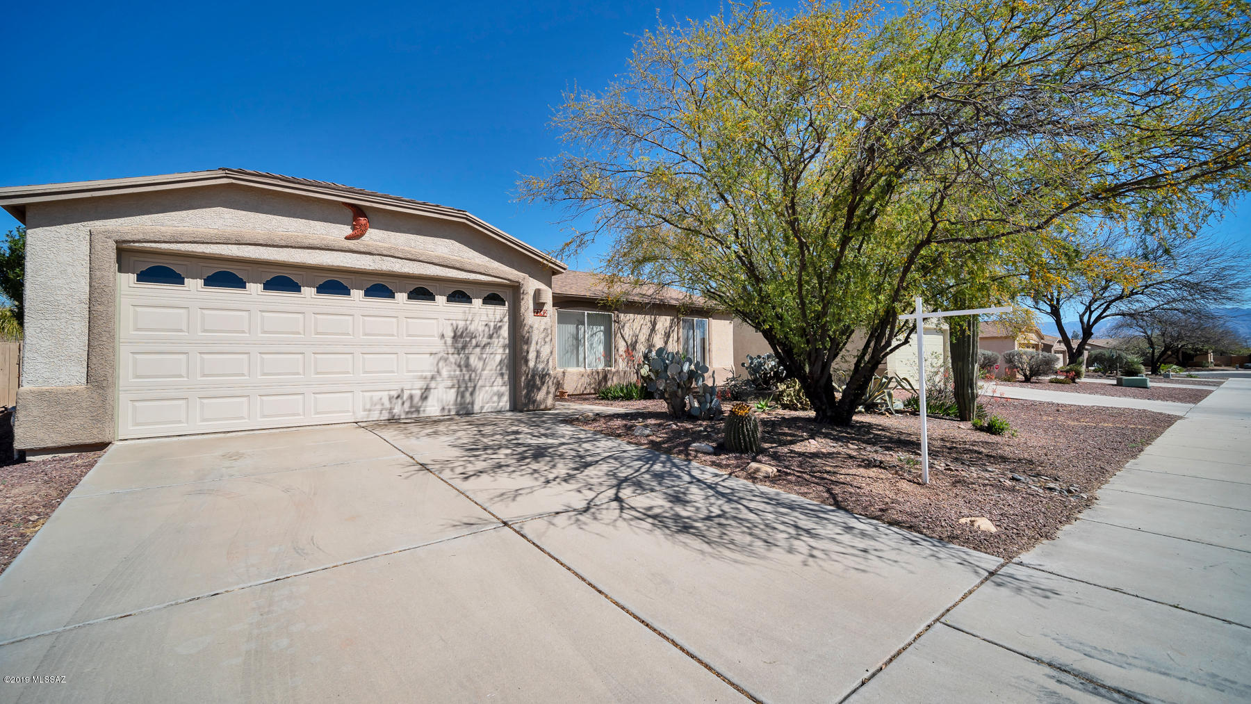Move right in to this split 3BD/2BA home located in the Silver Moon Subdivision. Well maintained home by the original owner, all quality laminate flooring and tile throughout, no carpeting, open floor plan with vaulted ceilings. The master bedroom boasts a HUGE walk in closet. Bright and open kitchen with stainless steel appliances, including an upgraded Bosch dishwasher, and, GE Profile gas stove, lots of cabinets and a pantry for your storage needs. If you have a green thumb you will love this private backyard featuring custom grow boxes, drip system, storage shed, with mature citrus trees, and a extended covered patio for your enjoyment, and entertainment. The garage has a work bench, soft water system, and upgraded garage door with windows, for lots of light! Great location for all your shopping needs, and quick access to I-10.