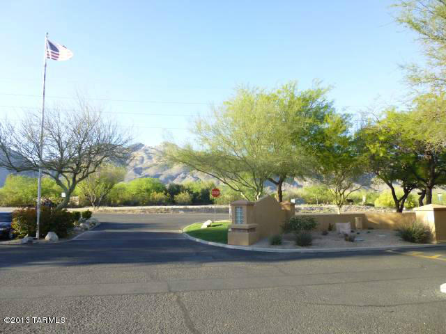 This lovely ground floor unit offers 2 bedroom, 2 bath fully furnished tastefully decorated condo, all within the Gated Community offers huge pool with cascading waterfall, spa outside , fireplace patio & fitness center.  The unit has private patio & cozy fireplace plus covered parking. All this in walking distance of grocery store, restaurants & many shops. Hike, bike or Tran ride in near by Sabino Canyon.  Electric fireplace.