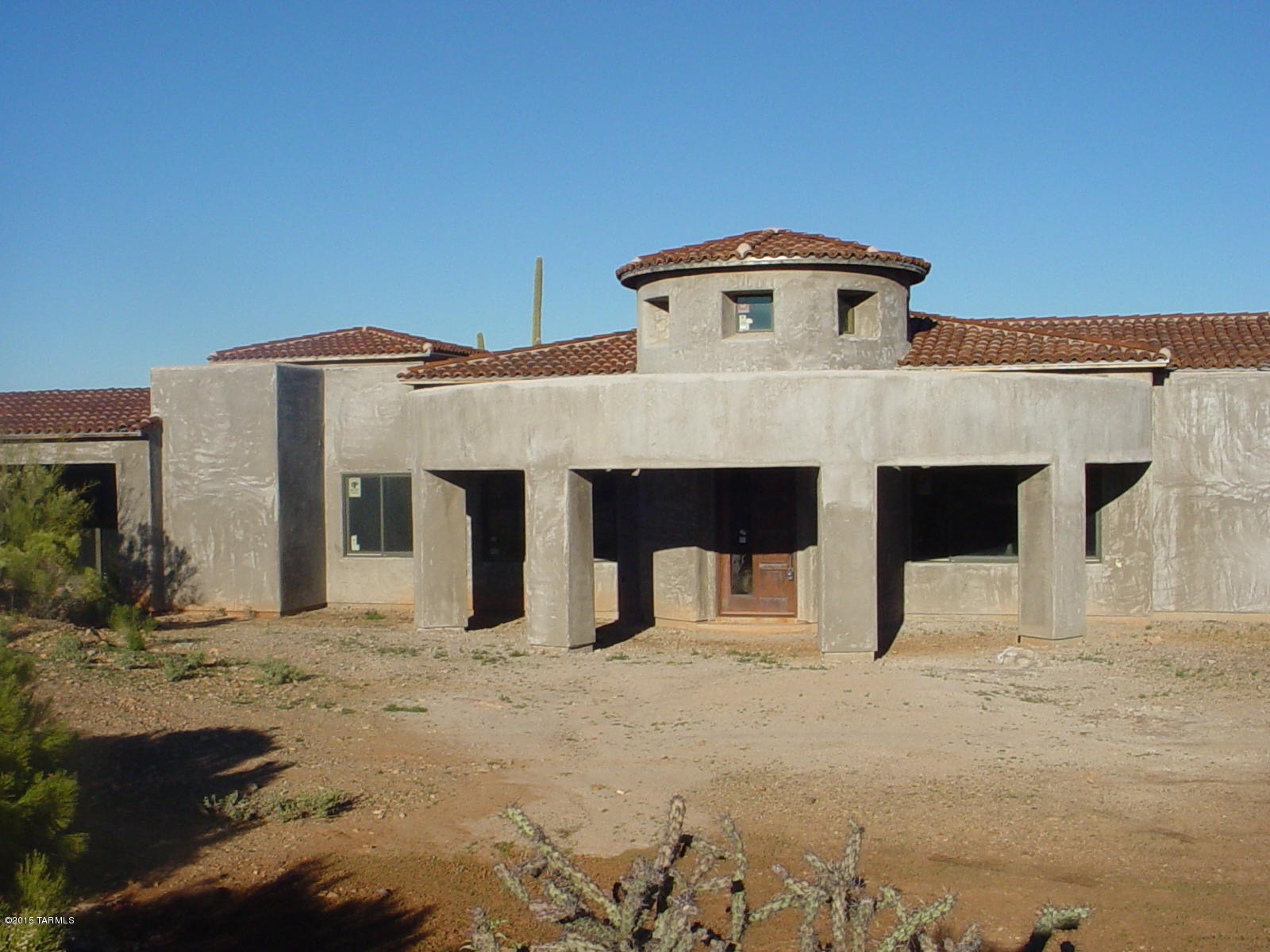 Rare opportunity to complete this unfinished custom home. It is being sold as is. Per previous plans filed with the assessor the main home has 3 bedrooms, a den, a media room, family room with 5836 SF, there is also an upstairs guest house/quarters with 1277 SF.  There is currently no access to guest house. A ladder will be necessary for your home inspection. No septic has been installed. No utilities will be turned on, no SPDS or CLUE provided. Please use seller's choice for escrow. BUYER MUST COMPLETE ALL INSPECTIONS BEFORE MAKING AN OFFER-NO EXCEPTIONS. OFFERS WILL BE AS IS WITH NO INSPECTION PERIOD.