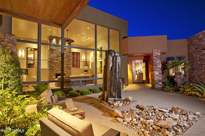 METICULOUSLY CRAFTED AND NESTLED WITHIN THE INFAMOUS STONE CANYON ROCK FORMATIONS. SWEEPING TORTOLITAS AND CATALINA MOUNTAINS ON THE 17TH FAIRWAY. IMPORTED ZEBRA WOOD KITCHEN CABINETRY. CUSTOM BLACK MARINACE GRANITE FROM BRAZIL. MEDIA ROOM WITH BAR AND BLACK OUT BLINKS, CUSTOM PADDED WALL TREATMENT. ADDITIONAL WALL TREATMENTS THROUGHOUT, INCLUDING BAMBOO INLAY AND TREE BARK. LOCAL IRON CRAFTSMAN WORK, BASALT VOLCANIC ROCK FOUNTAIN IN COURTYARD. DUAL LAUNDRY ROOMS, SOARING CEILINGS WITH WALL OF WINDOWS TO CAPTURE THE BEAUTIFUL SURROUNDINGS. EXTRAORDINARILY DECORATED BY THE TALENTED  LORI CARROLL. FOR VIDEO PRODUCTION FOOTAGE OF THIS HOME PLEASE CUT AND PASTE TO BROWSER: https://youtu.be/p9kqui3TVoc