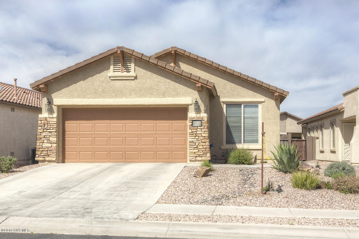 Enjoy 55+ living in Rancho Sonora, a Del Webb community in the heart of Rancho Sahuarita. This Ventana model is a 3 BR, 2 BA split bedroom. Great room plus eat-in kitchen with Corian counters and tile in kitchen and baths. Spacious master bedroom features bay window and walk-in closet. Master bath has executive height counter, dual sink vanity. Low care yard. Enjoy the private amenities exclusively for Sonora residents, including clubhouse, pool, spa, library and more! Or take advantage of the family friendly amenities of Rancho Sahuarita.