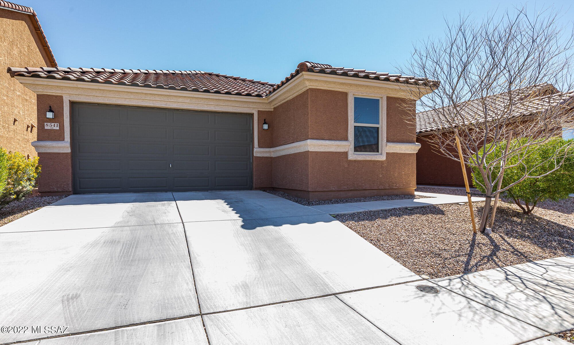 This ENERGY STAR® certified home is in a lovely neighborhood waiting for you! This home features 3 bedrooms, 2 bathrooms and a den with custom cabinets in kitchen, and way up, 9 foot ceilings in this open floorplan home. Great for entertaining and chill home spaces. Double sinks, plus a large shower in Master suite bathroom. You'll find tile throughout the house in all main areas including Den, and carpet in the bedrooms. Refrigerator, ceiling fans and window coverings are included.
