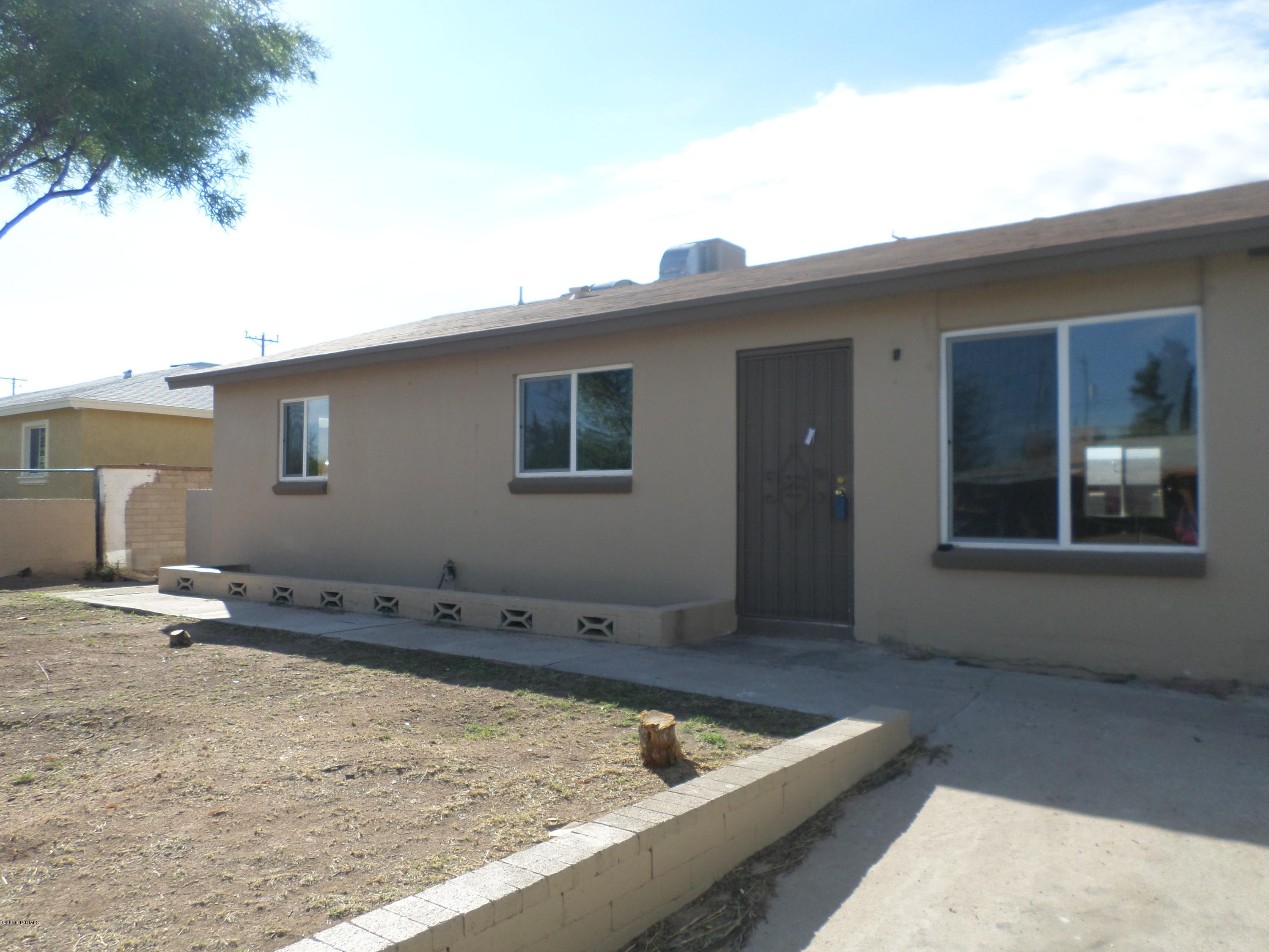 Nicely updated home.  New two-tone interior paint.  New tile in living areas, new carpet in bedrooms, new light fixtures.  Large living room, cozy fireplace in the family room.  All new dual pane windows.  Large backyard with BBQ area and covered patio.