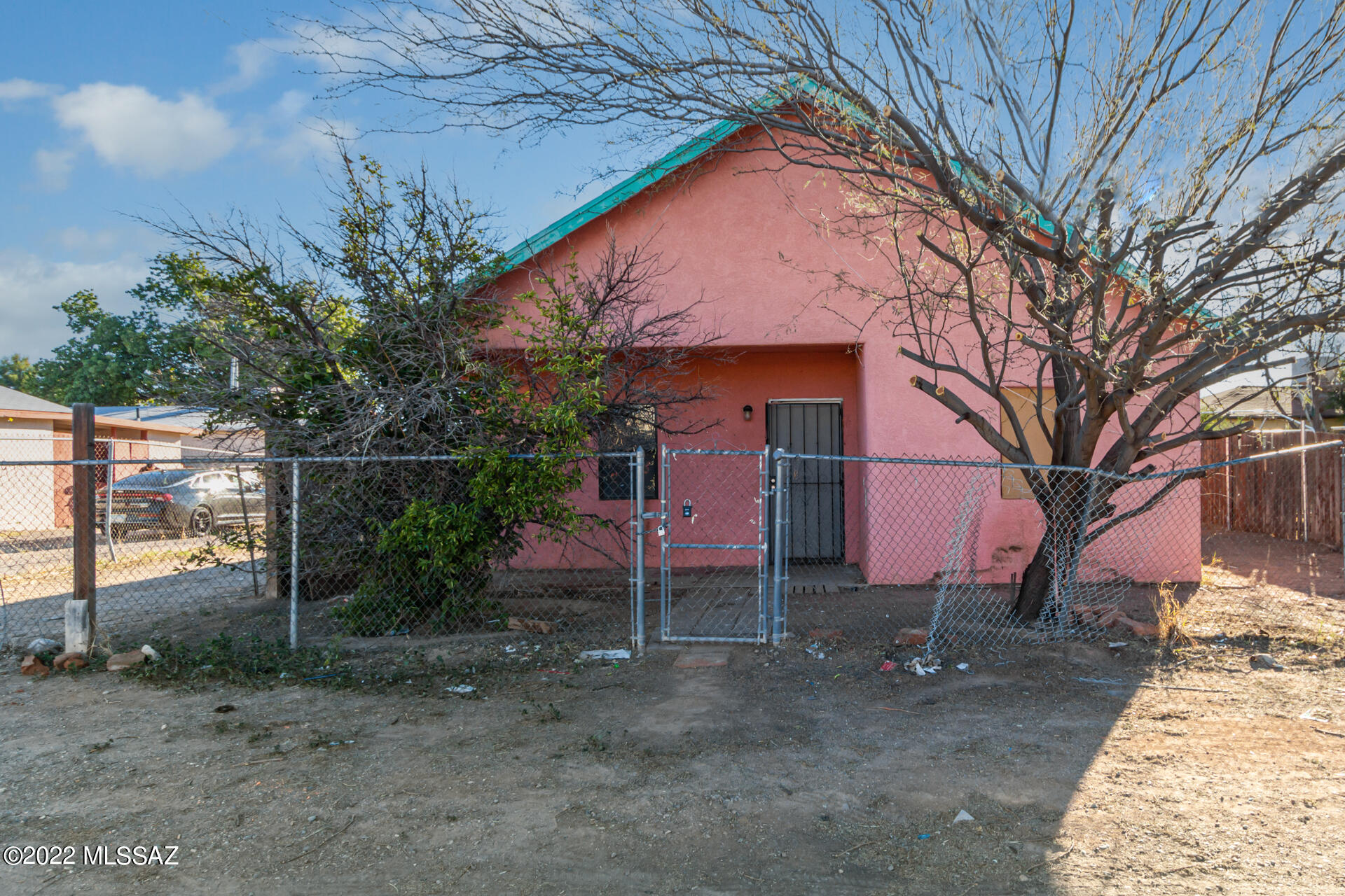 If you are looking for a new project, you've found it! Approximately three miles from the University of Arizona, this property, with two structures on it, would be ideal as an investment property for student rentals! The home in front is 1004 SQFT with two bedrooms and one bathroom, and the home in the back is 687 SQFT with two bedrooms and one bathroom.