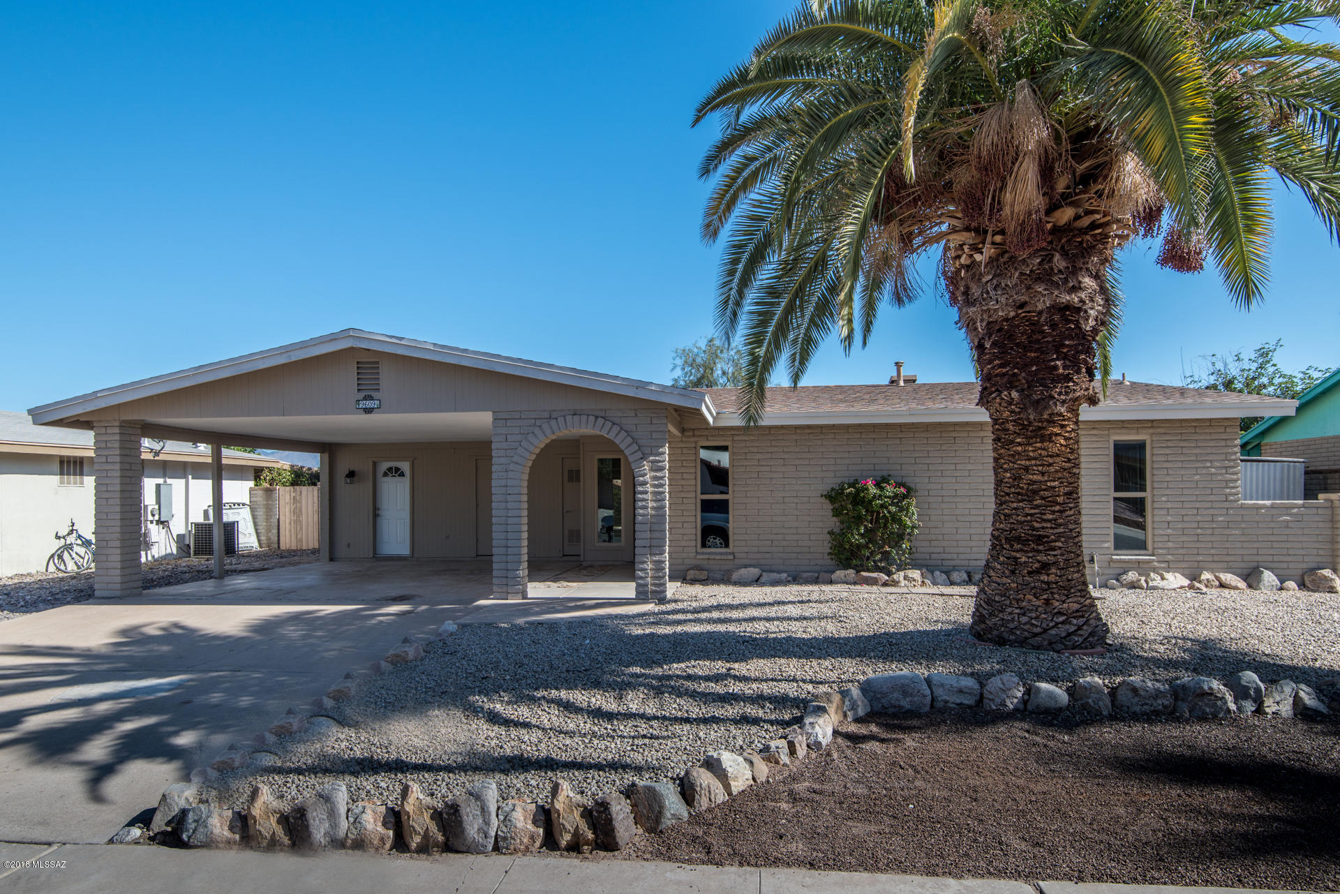 Beautiful remodel you don't want to miss! This home features new paint (interior and exterior), new granite countertops, all new fixtures, freshly painted cabinets, new flooring throughout (wood-plank tile and carpet), new 6-panels interior doors, new baseboards, and newer AC, windows, and roof. The backyard is perfect for entertaining with a covered patio, sparkling pool, and large grassy area.  A must see!