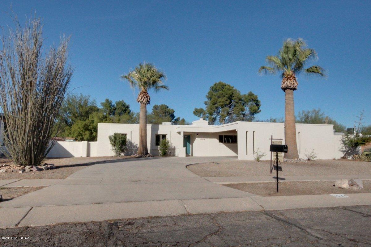 Woderfully Remodeled West-side home backing to lush openspace with Sparkeling Heated Pool and Spa. All New Paint inside and out, New Wood-look Tile floors, New Carpet, New Ceiling fans and Fixtures and Freshly Re-coated Roof. Updated kitchen with granite countertops and stainless steel appliances. Fantastic breakfast bar and serving counters off kitchen and Dining areas. Don't miss the huge storage area off the 2-car carport. Fantastic Neighborhood is close to downtown with easy I-10 access. Owner/Agents