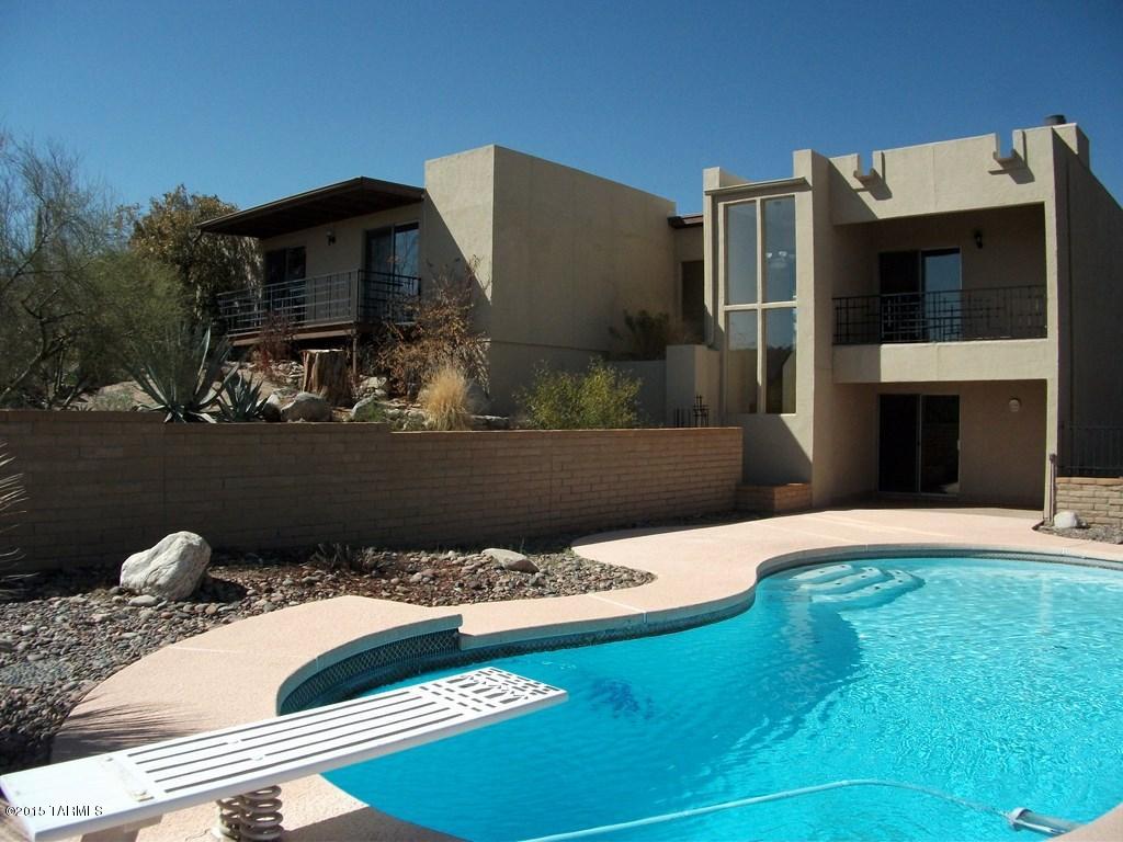 What an amazing home to rent. 3 bedrooms/3  Baths and 2457 square feet. 2 fireplaces one of which is in a huge game room with a full wet-bar that walks out to pool. Tons of natural light from the many windows the home has. Kitchen has refinished cabinets, granite counters and stainless appliances. Bathrooms have been updated with marble vanities and new fixtures. Multiple balconies give you gorgeous mountain views. This home is offered as NON-SMOKING. Pets subject to owner approval.