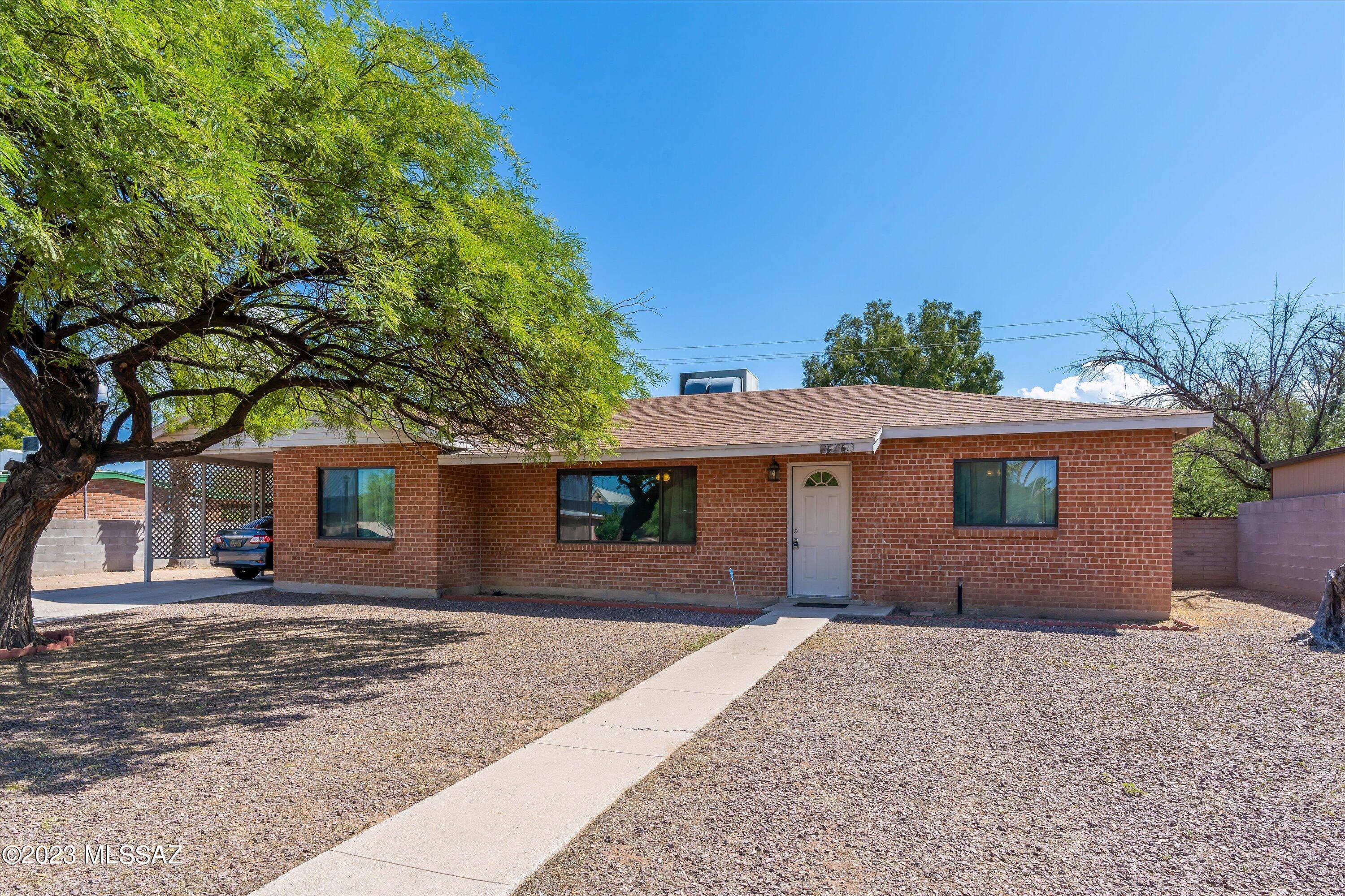 This well maintained three bedroom two bathroom house is located in the desirable east central Tucson. This home was recently renovated and offers a great open floor plan and upgraded finishes. The back yard is large and offers lots of entertaining and relaxing options. With plenty of room for an RV, Travel trailer or multiple parking options there is roof for the Toys and more.
