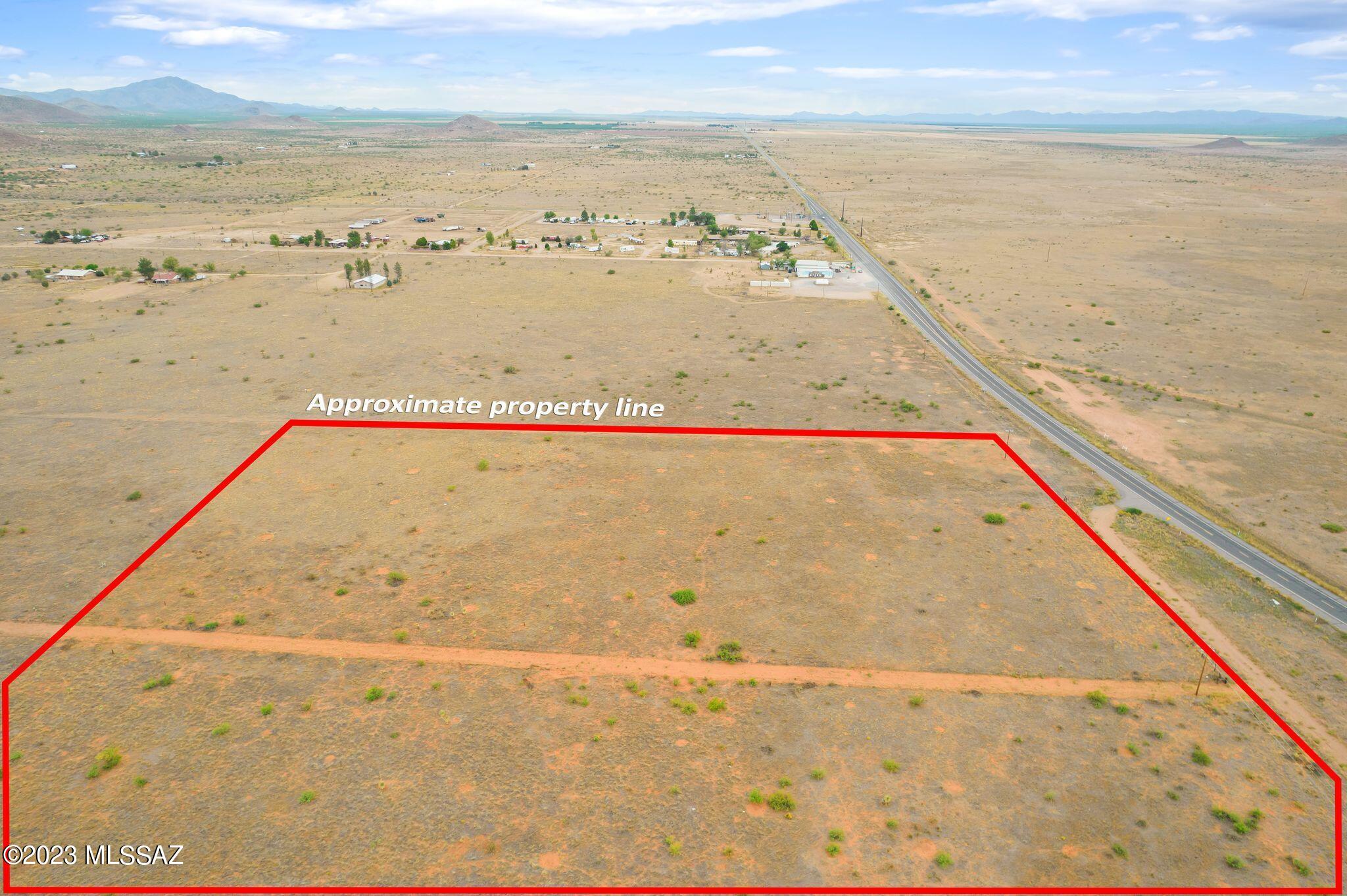 Wonderful opportunity to own 54 acres of land in Pearce, AZ. Great location for your dream home or land investment, right on Highway 191, central location, plenty of room for cattle, horses or to enjoy ranch living with beautiful sunsets. Power is on the property line and water company service is available. Drive by and see the possibilities! Zoning: General business highway frontage is 14.5 acres with the remaining balance (40 acres) high density SR-8 single family residential dwelling. One home per 8,000 square feet. Call now for your private tour.
