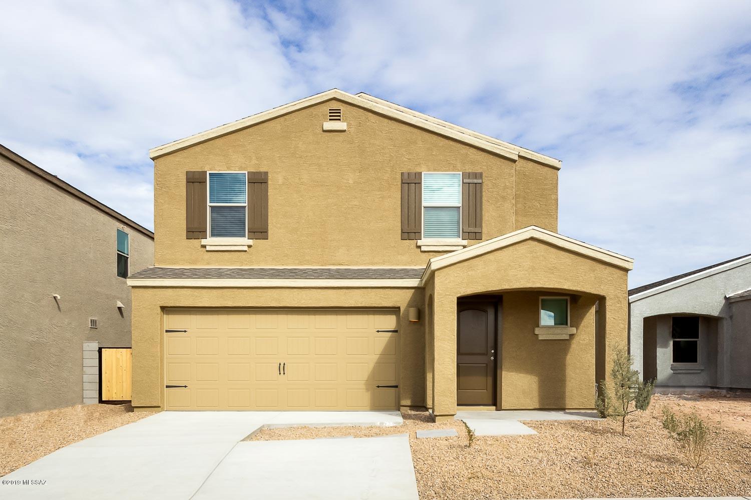 The Palo Verde is a beautiful, two-story home featuring an open floor plan with 5 bedrooms and 3 full baths. This home includes energy-efficient kitchen appliances, granite countertops, a fully-fenced backyard, front yard landscaping and an attached two-car garage. Whether upstairs or down, you will find an abundance of space for entertaining guests in this home! The gorgeous kitchen includes a center island and overlooks a spacious dining and living area. In addition, the spacious loft area upstairs can be used as a media or game room. Another highlight of this home is the downstairs guest room. The Palo Verde is found in the neighborhood of Cantera, which is located near a variety of entertainment opportunities.