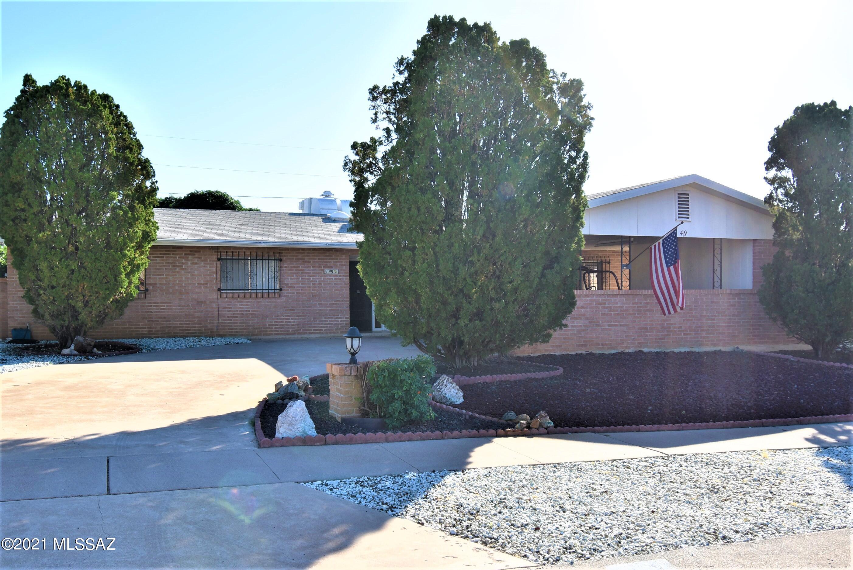Beautifully maintained red brick house situated in the desirable community known as Corona de Tucson.  Enter this elegant 3-bed, 3-bath with 1,674 SqFt & you will find a bright and spacious home. The foyer leads to a huge great room perfect for today's lifestyle. The kitchen is classically designed with abundant cabinets and tons of counter space.  Master is spacious and has its own private bath. The large patio is ideal for year-round entertaining. Oversized concrete driveway will provide tons of room for all your cars, toys or work vehicles. Big bonus, there is NO HOA.
This house is in the sought-after Vail School District. ****Update on NOV/2021 BRAND NEW Shingle Roof, BRAND NEW AC & Heating, Brand NEW 220 Electric Panel, & BRAND NEW Sewer Cleanout Ports, Over $35,000 in Upgrades!****