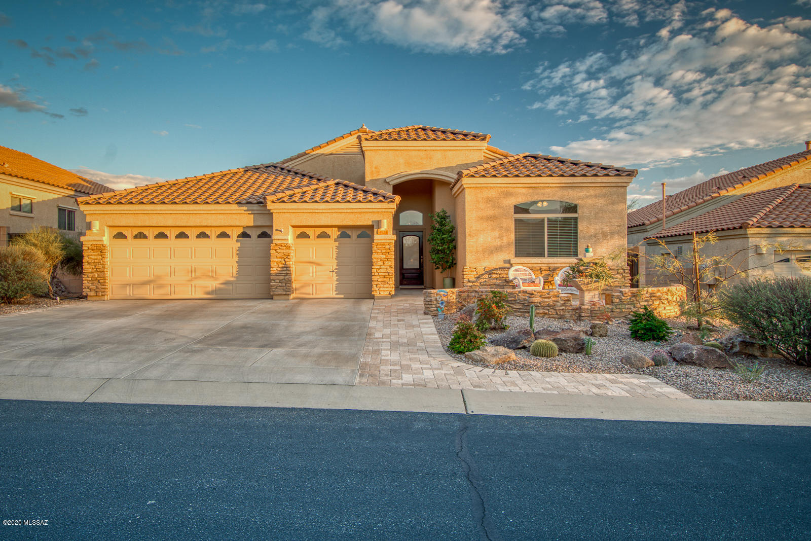 The Preserves at Dove Mountain, this private gated community is the perfect place to call home. From the time you walk up to the custom front door on travertine brick pavers and step into the 2338 sqft, 4 bd, 2 ba home you will fall in love. Split floor plan, open great room to the kitchen and formal dining room with crown molding throughout. Travertine flooring sweeping through the home. Kitchen featuring granite countertops, oversized kitchen island, upgraded appliances and abundance of kitchen cabinets giving you plenty of storage. Off of the great room you will be greeted by French doors into a multi use space, office or craft room with built in cabinets. Step out to the extended outdoor living space, enclosed screened in patio, outdoor kitchen, turf grass, raised planter and the natural preserve, view fencing to enjoy the sunrise and sunset views. You will love the space both indoors and out.  See it today before it's gone.