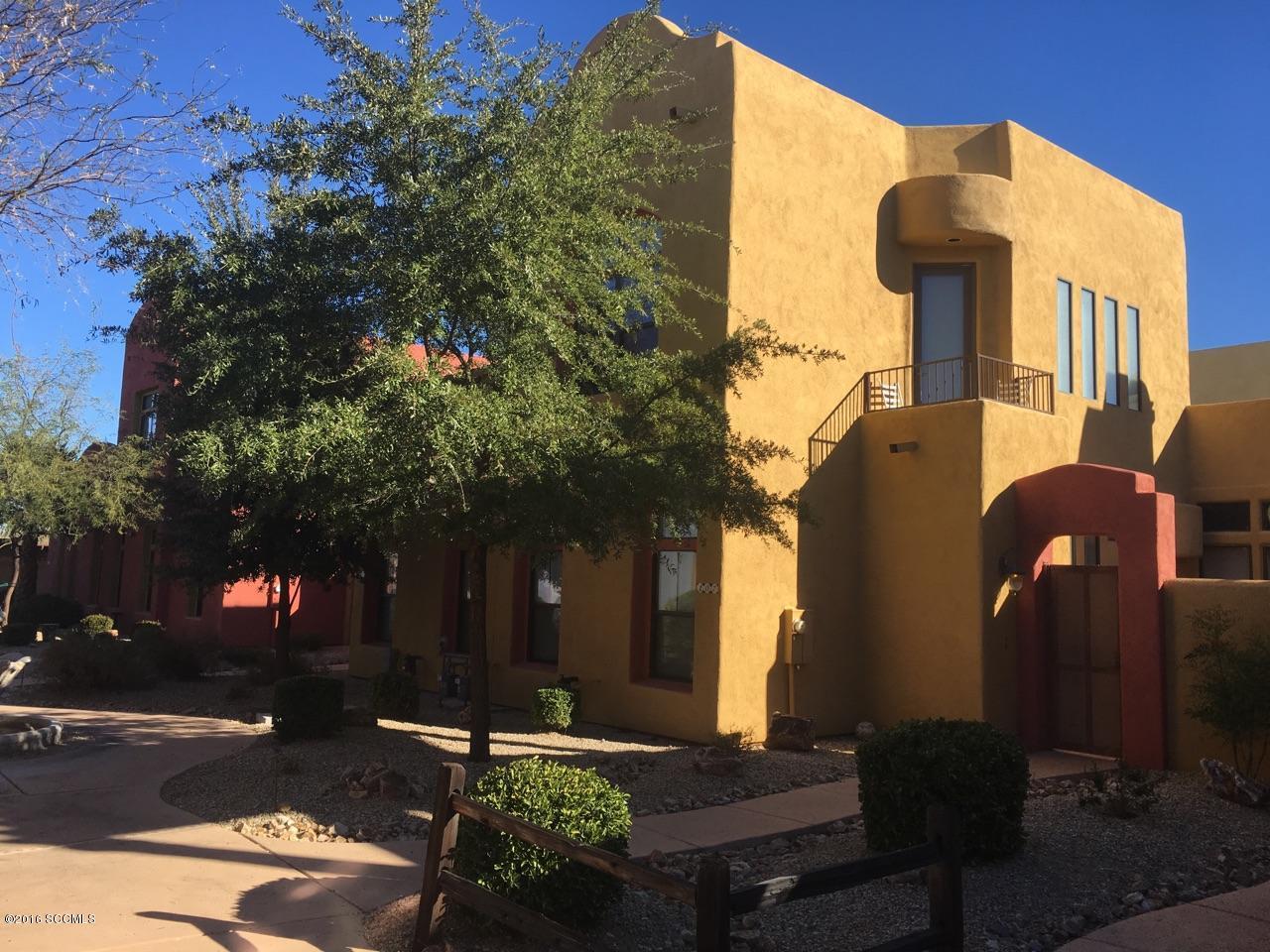 Popular townhome with two master bedrooms each with bath and walk-in closet. Unfurnished one bedroom upstairs and one bedroom upstairs. Enter through a gated courtyard into the great room with corner kiva fireplace and dining area. Home has a hallway nook/desk. View of the mountains from the upstairs balcony, faces West. Community pool/spa and fitness center. Perfect for full time resident or getaway.