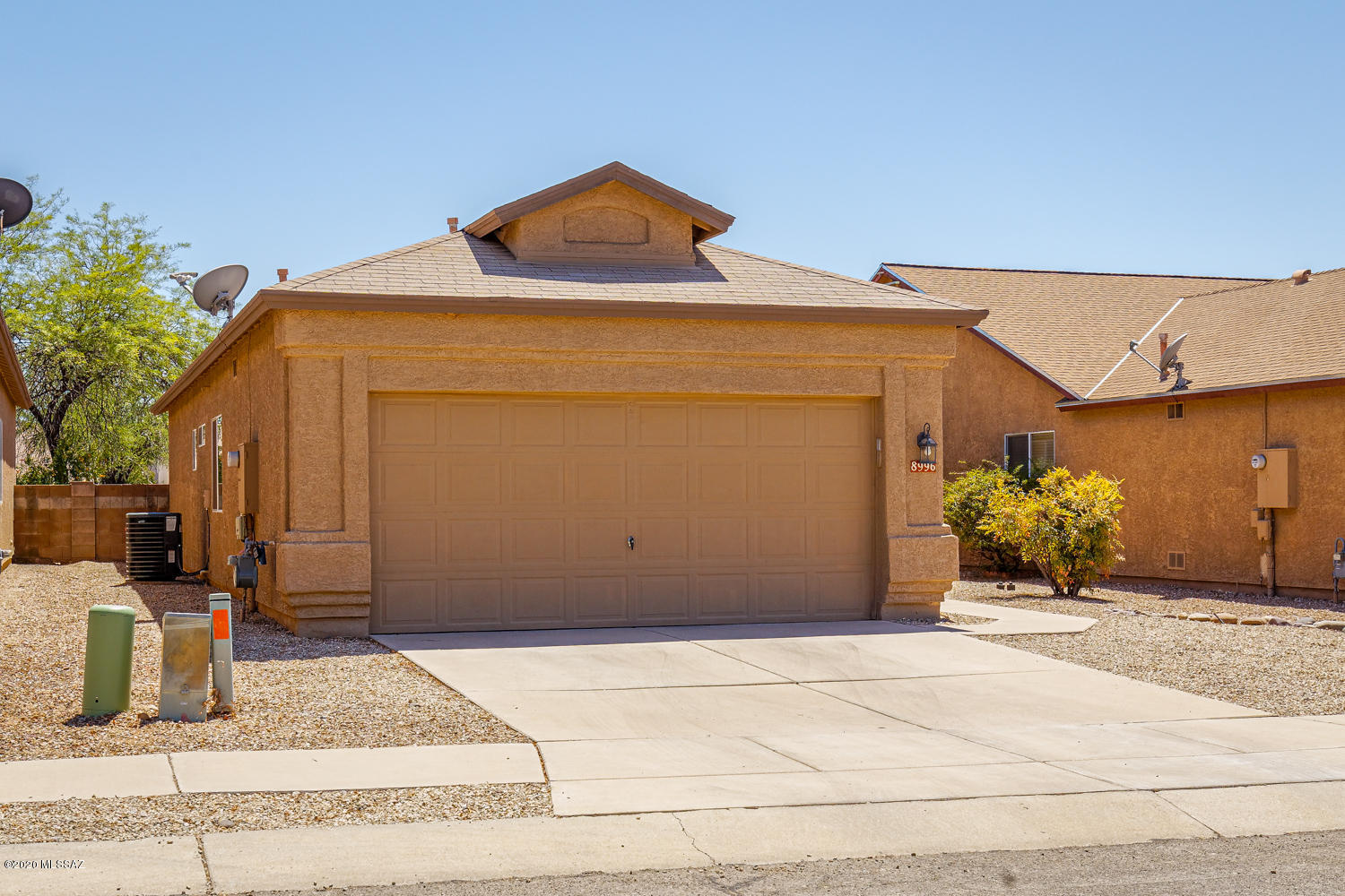 Nicely updated, truly move-in ready home in the heart of Rita Ranch! Ceramic tile & laminate wood floors throughout the home. Upgraded cabinets in the kitchen including granite countertops. Large backyard with plenty of room to entertain & extra shade. Vaulted ceilings, convenient to I-10, Davis Monthan, Amazon, Target & more. This is a must see home!