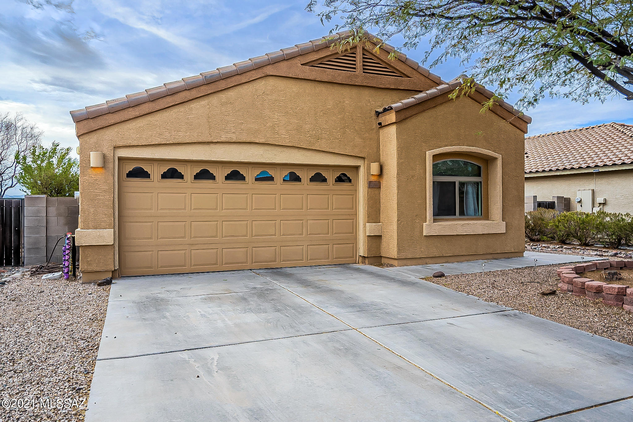 This beautiful home is nestled in a gated community & boasts three bedrooms and two baths. Impeccable backyard landscaping, Corian countertops, walk-in master closet, large pantry, tons of linen space, grand open floor plan close to shopping and I 10. Call for your private showing. Open House Saturday & Sunday 11-3 must call for gate code.