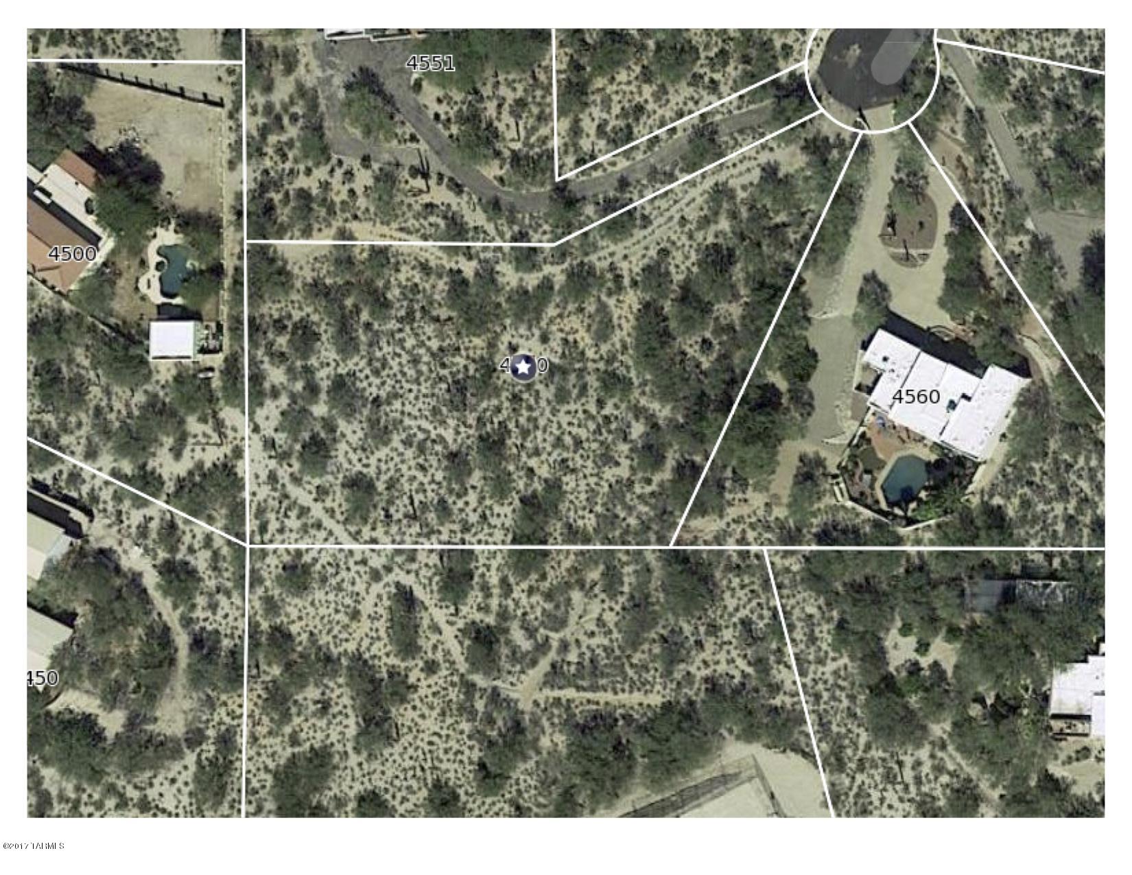 Last lot in convenient Central Foothills Enclave. Sweeping mountain & city views from lush private oasis. Surrounding homes already built. Park at end of quiet cul-de-sac & walk up gently sloped path. Wonderful design flexibility. Beautifully platted original lot. TEP, water, phone & cable have already been brought to approximate mid-point of north boundary.