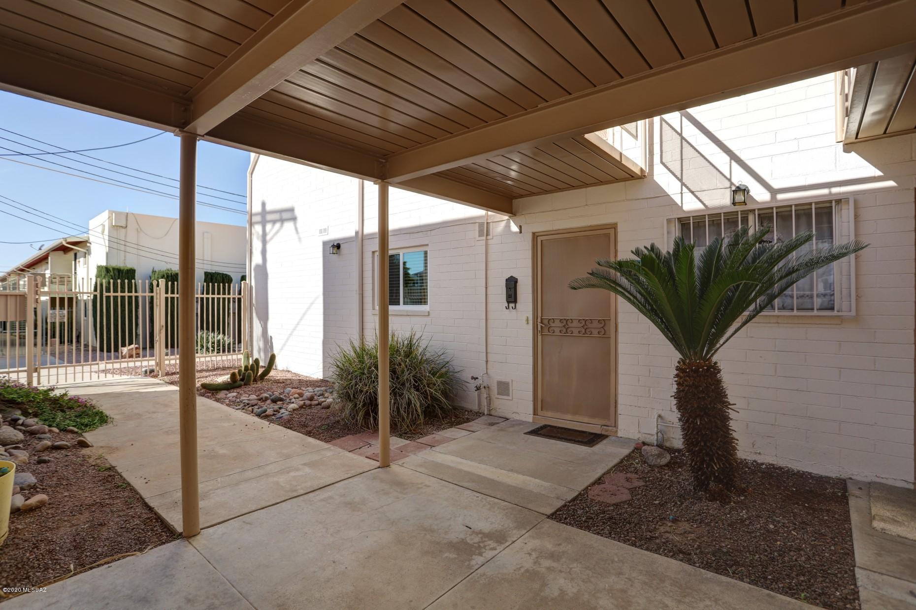 Amazing Affordable Condo In Central Tucson. Seller has added many features to make living more comfortable. Enclosed Patio to provide a sitting area, replaced sliding Patio door,Added two split Hvac units, replaced all windows, etc. etc. Gated patio off Bedroom. Monthly Fee includes Water/Sewer, Garbage,Prop Taxes,Roof Maintenance, Landscaping and Outside Pest Control.Enjoy the amenities at Reid Park.