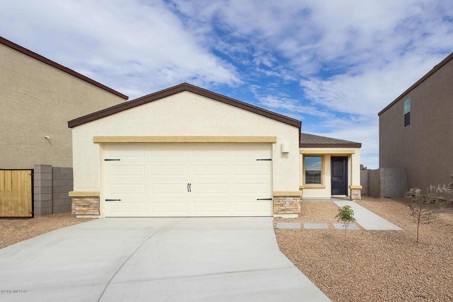 The beautiful Ironwood plan is located within the picturesque community of Cantera. This new one-story home features an open floor plan, 3 bedrooms and 2 full baths, complete with thousands of dollars in upgrades. Upgraded features include energy-efficient kitchen appliances, granite countertops, designer wood cabinets, brushed nickel hardware and an attached two-car garage. The Ironwood showcases a luxurious master suite complete with a walk-in closet, as well as a fully fenced backyard, and front yard landscaping. In addition, Cantera provides residents with easy access to the best of Tucson.