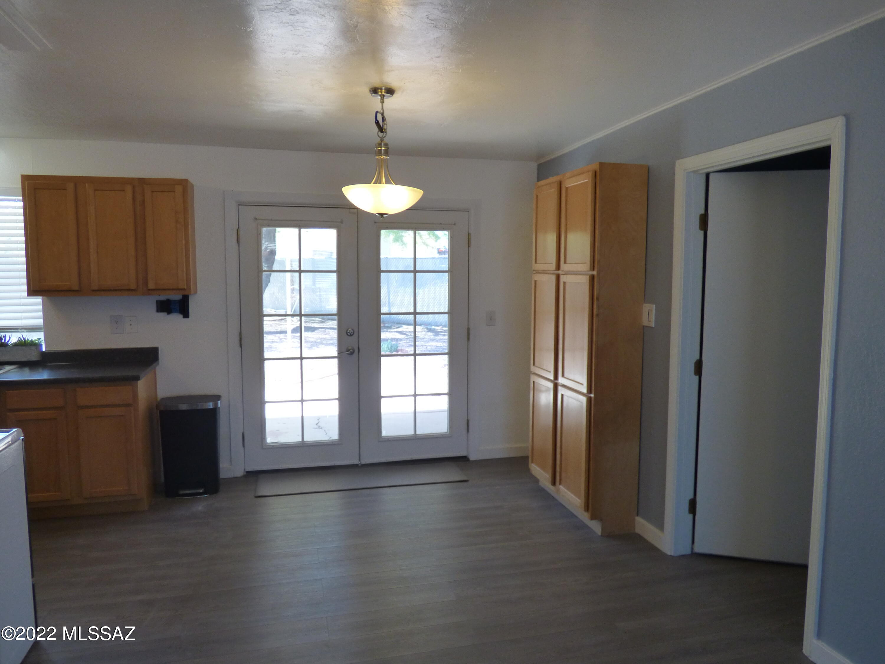WOW. THIS IS A CHARMING HOME WITH MANY NEW EXTRAS. LARGE 3RD BEDROOM,  FANS, WOOD FLOORING WITH NUETRAL CERAMIC TILE. SOME BUILT-INS THROUGH OUT THE HOUSE. LARGE BACKYARS WITH SHADE TREE. CALL TODAY