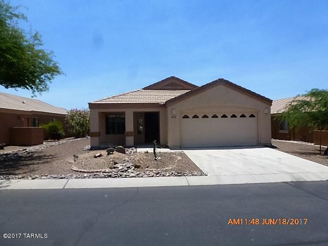This 4 bed, 2 bath home is in one of the best 55+ communities in Marana! You can enjoy the golf course from your back patio, and also great mountain views.  Open floor plan, and a big kitchen. Plenty of room for a guest, as you have 4 bedrooms. It has a separate laundry room, and a 2-car garage. Lots of facilities & amenities in this very special subdivision, designed for active seniors! Play golf, or enjoy other games, jogging path, tennis etc. See attachment for PAS requirements and WFHM offer submittal information in MLS document section.