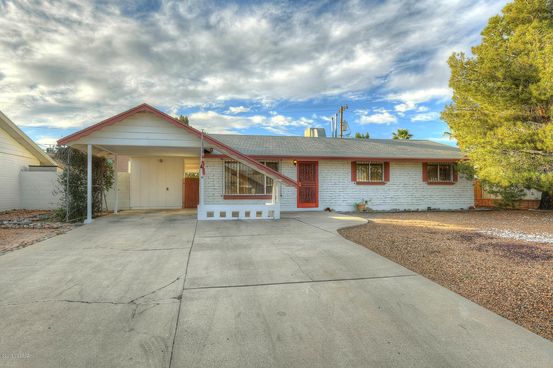 Seller will accept or counter offers between $150,000 -$159,000.  Yes you can!  Move right in to this 3 bedroom and 2 bathroom masonry built ranch style home. Large living room and separate dining area. Ceramic tile flooring and carpet in the bedrooms. Master bedroom has its own bathroom. New carpet in the master & one other bedroom.  HVAC new in 2015.  Large, completely enclosed backyard with grass. 1 car carport with storage room. Washer, Dryer and Refrigerator included.   Easy access to downtown, Park Mall shopping, Reid Park Zoo and Davis Monthan AF Base. No HOA.