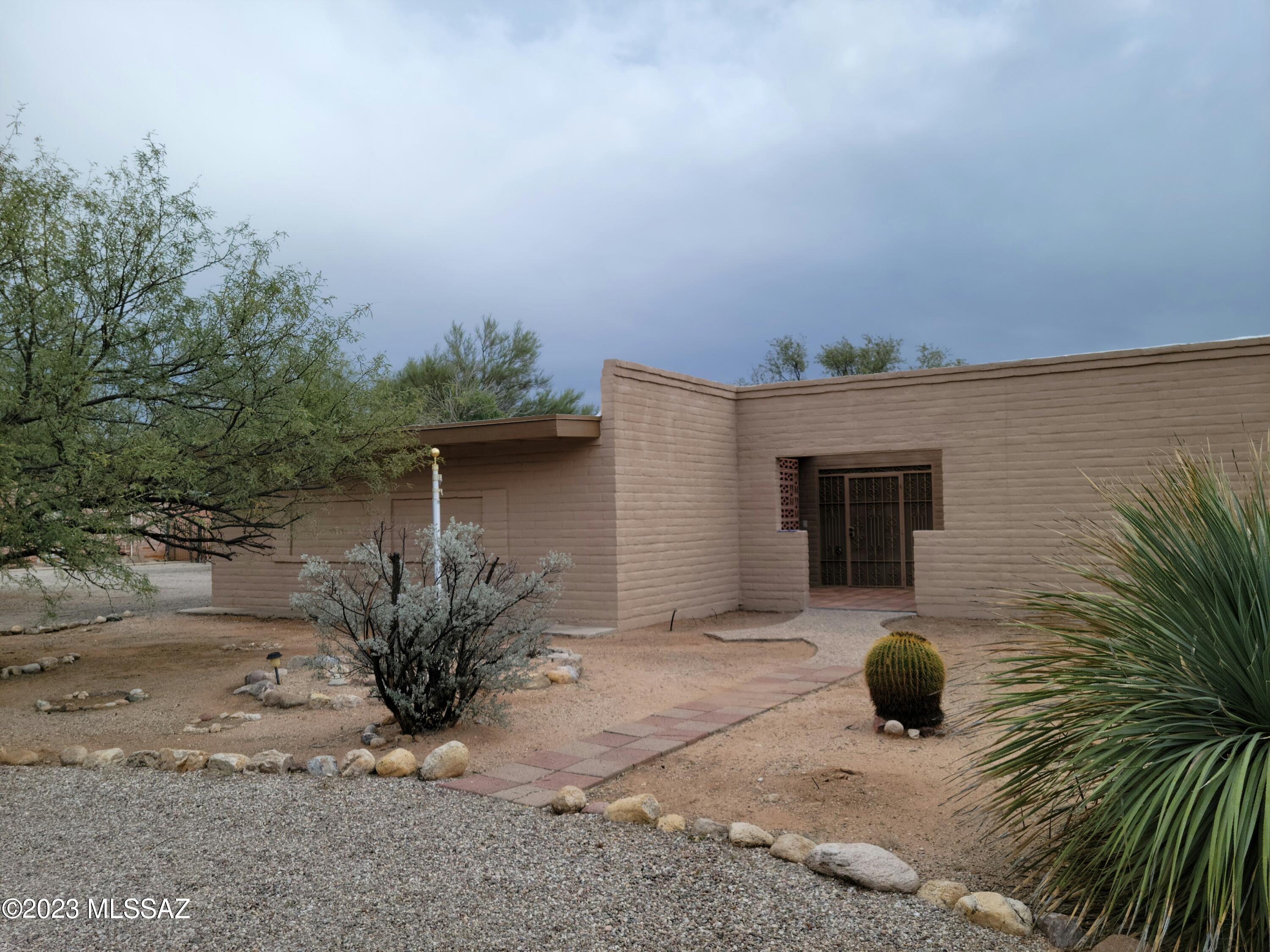 The wonderful home is in a very quite and beautiful neighborhood. Wonderful mountain views.  4 bedrooms and 2 baths. Family room and living room. New heating and cooling. Kitchen has new cupboards, new granite counter tops, new microwave and range. Both bathrooms are completely new. Back yard is wonderful for entertaining. There is a recessed fire pit with seating, covered patios and Bar.B.Q. There is a gate on the south wall that leads to more property. See picture of aerial.