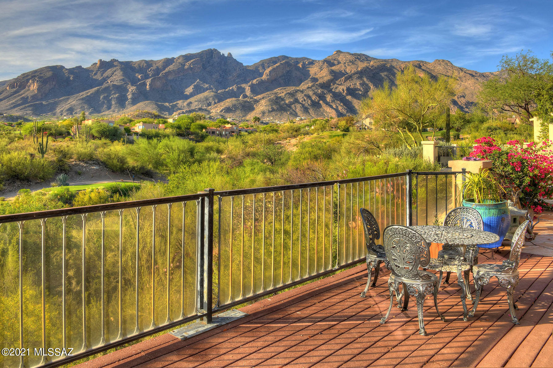 Spectacular elevated golf course view in La Paloma. Look out to the Catalina Mountains & the 13th Fairway of La Paloma's Ridge/Canyon Course.  A freestanding 2-BR/2 BA townhouse adjacent to common area for added privacy. Living room, AZ room and Owner's bedroom all open to the patio. Living room with a fireplace. The Owner's bathroom features large walk-in shower, dual vanities and a walk-in closet. Kitchen includes granite, cherry cabinets, SS appliances and is open to the family room. 2-car garage with built-in storage. HOA includes community pool, fire protection, refuse collection, managed guard gate and common area maintenance.