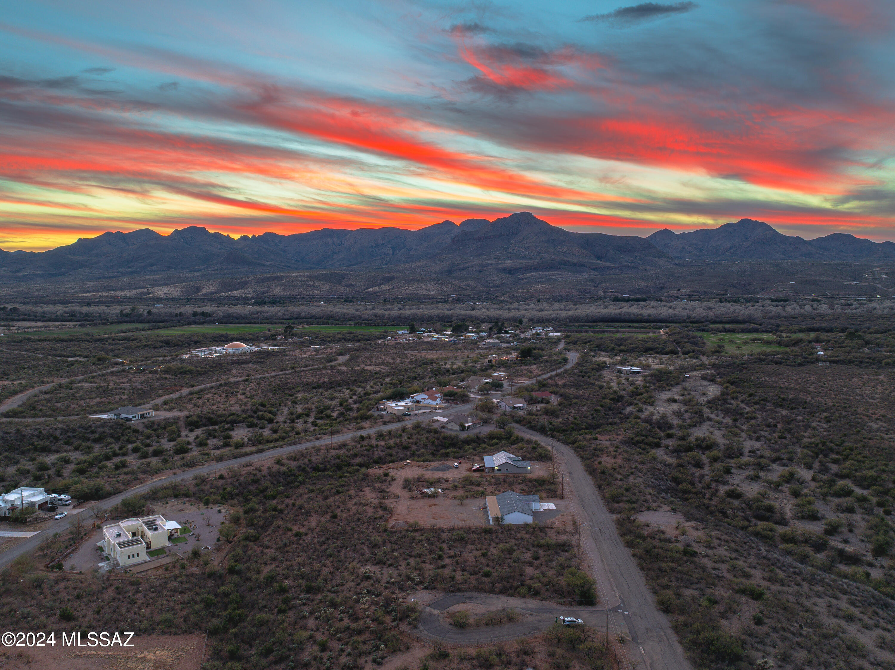 0.55 acres with access to electricity and water on a paved road in NE Rio Rico. Buildable lot with nice views in all directions 
and in a small cul de sac.