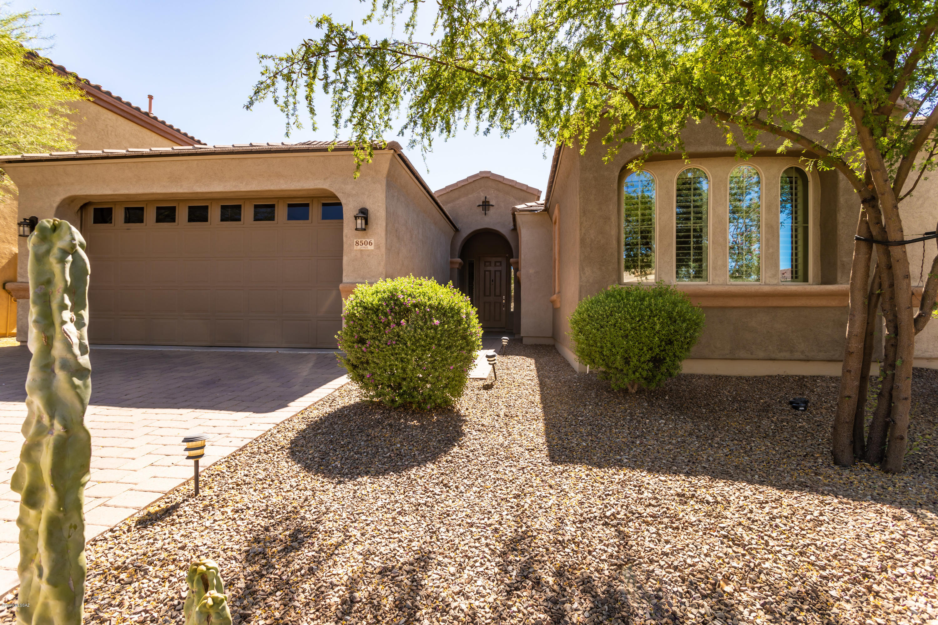 Welcome to the Beautiful, Highly Desirable & Guard Gated Neighborhood of OMNI Tucson National Golf Course! This Exceptionally Maintained, Open Concept Split Floor Plan Offers 3 Bedrooms/ 2 Bathrooms PLUS Den that could be 4th Bedroom. Stunning Wood-like Ceramic Tile, Plantation Shutters & Lofty Ceilings Invite you in to this Move-In Ready Gem. This Gourmet Kitchen features Stainless Steel Appliances, Granite Countertops & Large Island/Breakfast Bar, Subway Tile Backsplash, Recessed Lighting & Eat-In Dining Area. Relax & Unwind Your Large Master Suite w/ Soaking Tub, Dual Vanity, Separate Walk-In Shower & Generous Walk-In Closet. Step Out to your own Private Oasis Complete with New Pebble Tec, Salt Water Pool Installed May 2019, w/ In-Floor Cleaning System Waterfall & Wi-Fi enabled controls