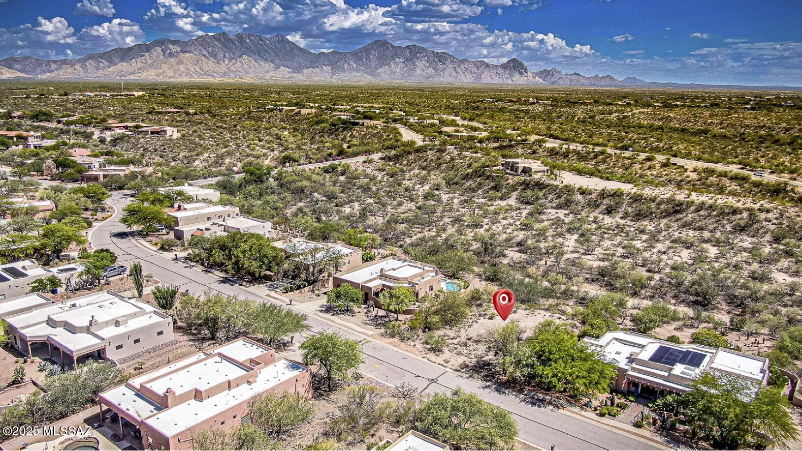 Embrace the serenity of the Sonoran Desert and wake up to breathtaking mountain views from your future dream home in Green Valley's desirable Madera Reserve. This 0.45-acre lot offers the perfect canvas to create the custom home you've always imagined—surrounded by natural beauty, peaceful surroundings, and unbeatable mountain views. Enjoy the freedom and flexibility of building in a non-age restricted community with LOW HOA fees and no direct neighbor behind you. All utilities are at the lot line, including sewer. Whether you're ready to start building now or investing in a future dream, this homesite offers a rare balance of location, value, and views. Green Valley Recreation available, but not mandatory.