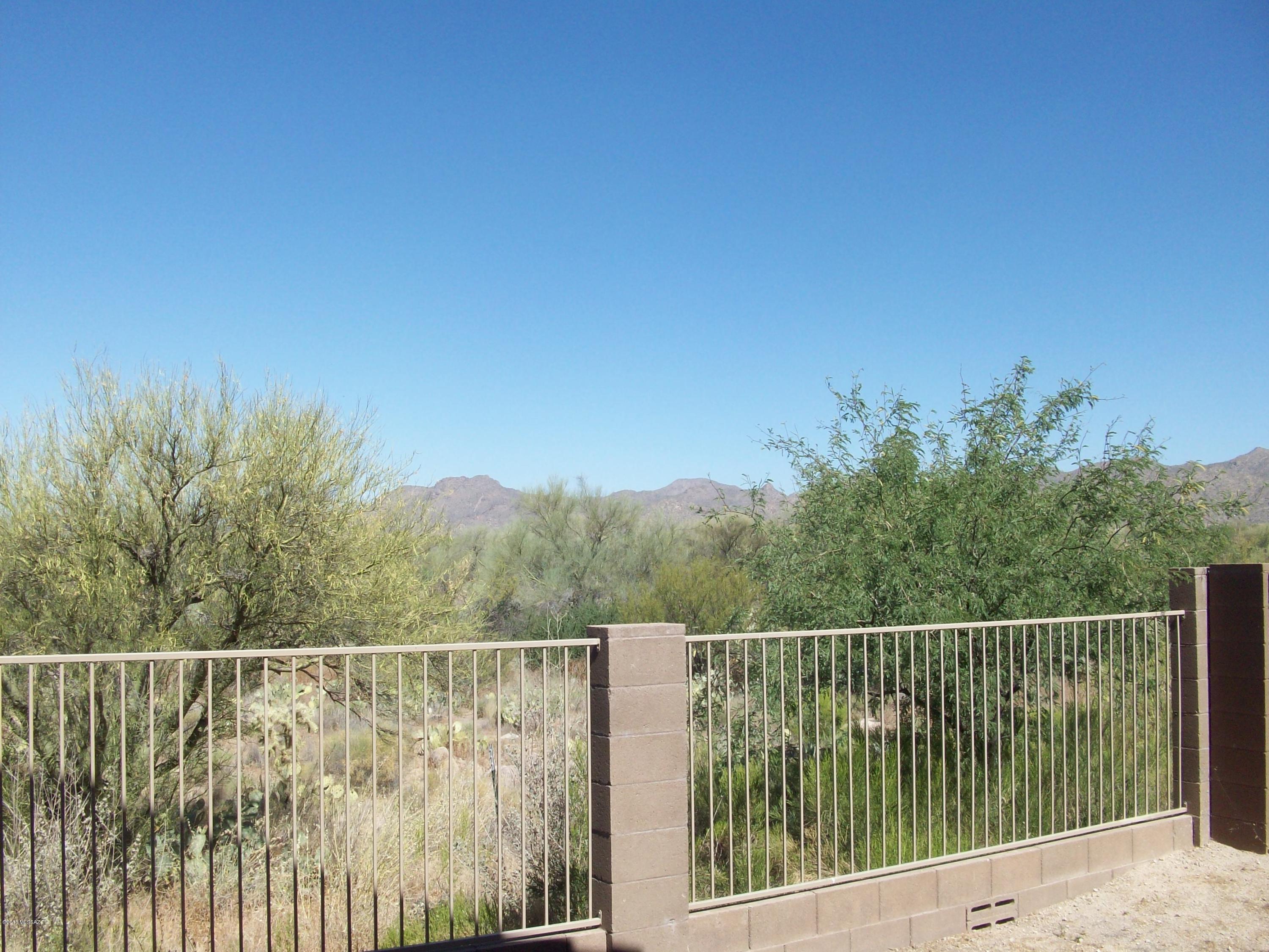 Beautiful Home in Rancho Vistoso community. 3 bedroom 2 bath, stainless steel appliances, large pantry, 2 car garage, maple cabinets, laundry room & so much more. Backyard backs up to natural desert. Must See! Call Romano Real Estate at 577-1000