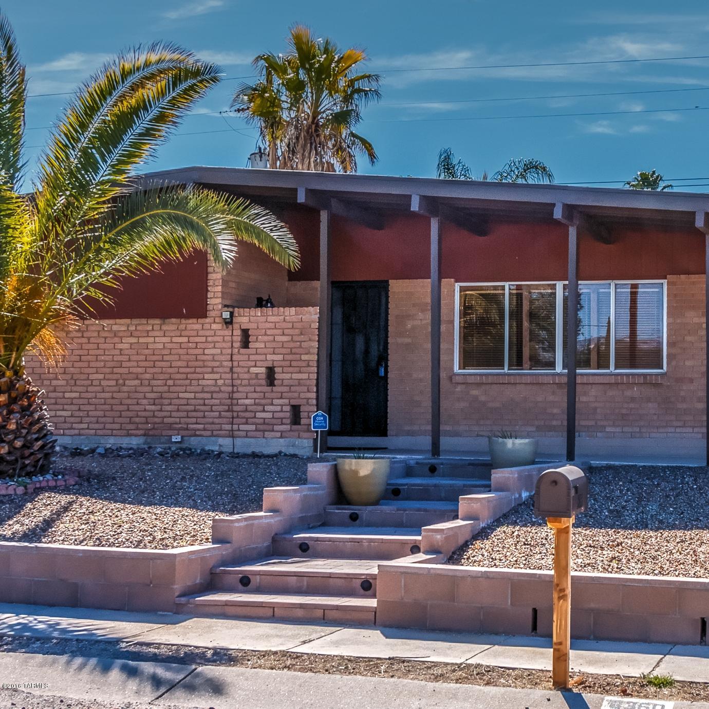 Gorgeous, immaculately maintained home!  This is a must see. Amazing custom kitchen with tons of storage and upgrades.  Great tile, newer carpet and paint finishes Provide a light, bright comfortable living space. Enjoy the wood burning fireplace, custom entertainment center, or the spa like back yard.  There is a covered patio/outdoor kitchen with a view of the sparkling pool.  Block wall on a corner lot.  The exterior was recently painted and the roof is well maintained.  The owner upgraded to a 200 amp electrical panel when the cold AC was installed. The thirty foot garage has ample storage and can fit a boat or a large truck. Make your appointment for a private showing today!