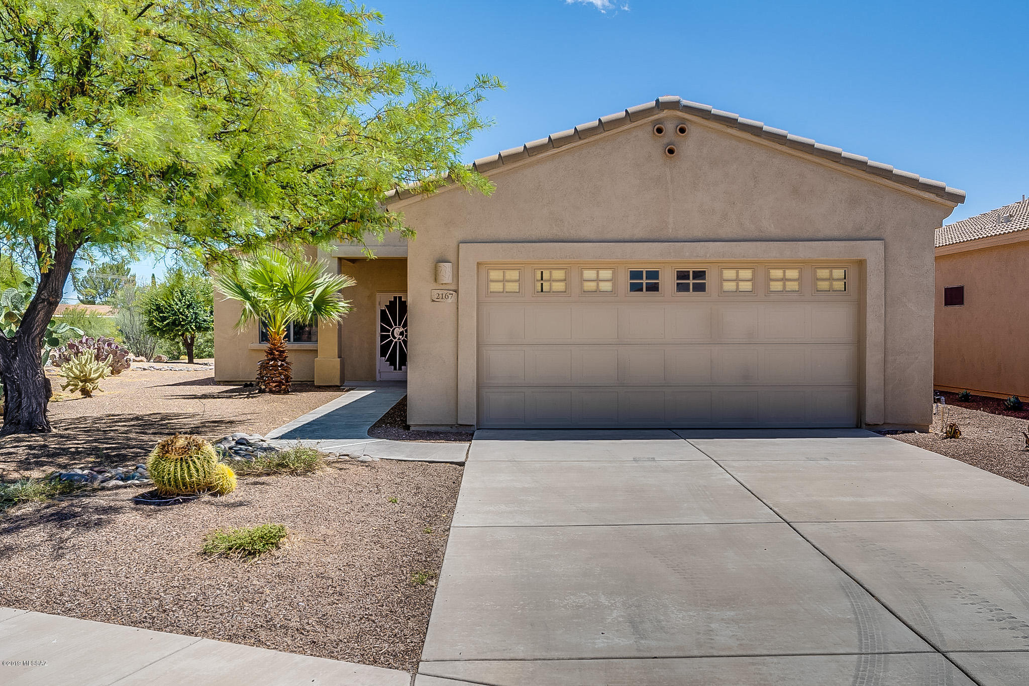 Corner lot! This 2 bedroom, 2 bathroom one level home with a 2 car garage is move in ready. Home has a welcoming entry that leads to the open living space with sliding glass doors that open to the backyard. Kitchen features nice cabinets and stainless appliances! All the bedrooms are spacious, master bedroom has a bathroom ensuite and a walk-in closet. In the backyard there is a covered patio and a beautiful view. This one is a must see!