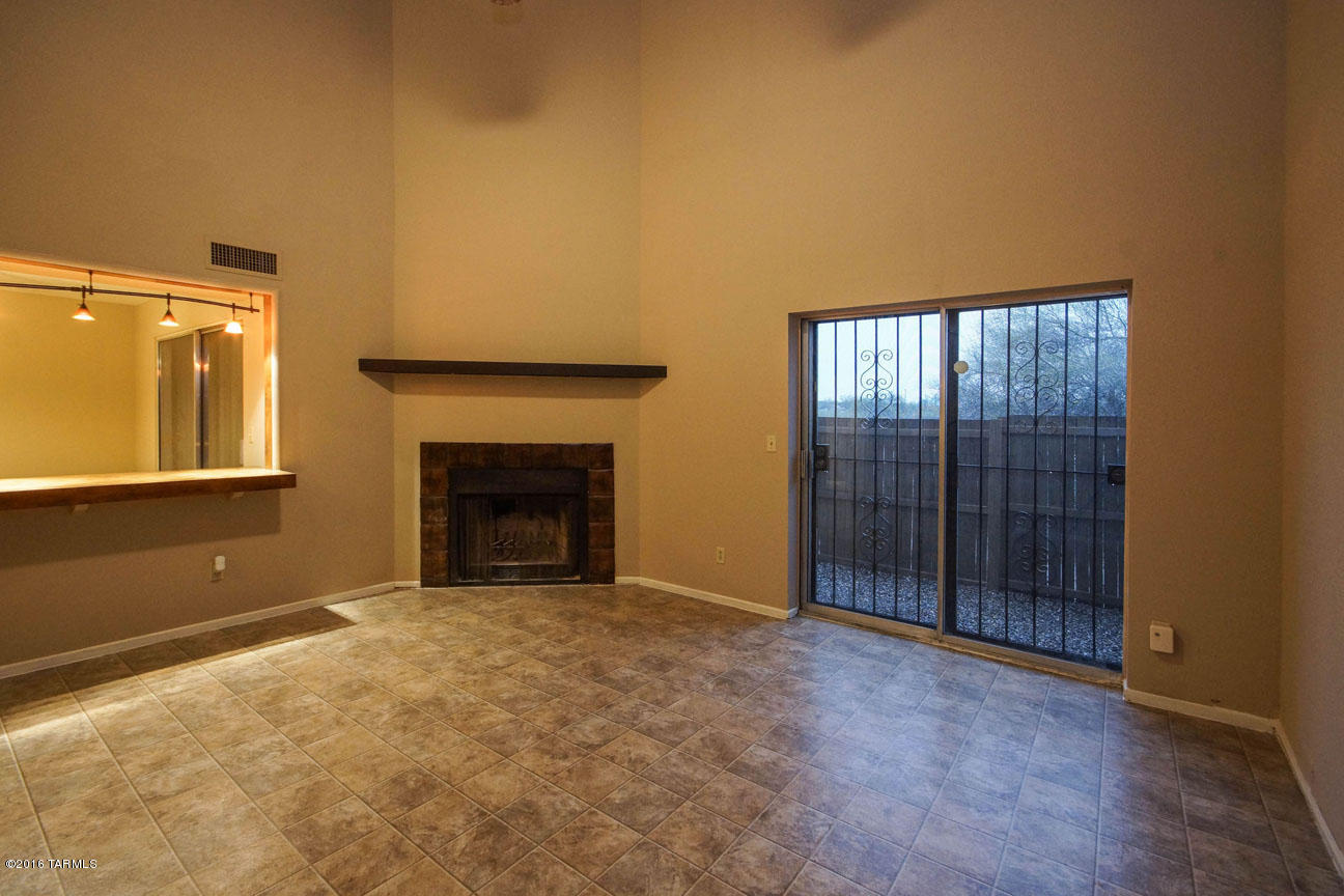 Please call Rob Alvarez @ 520.661.8657 for a showing!

4BR/3BA two story townhome. This 1860 sf treasure features fresh paint inside, beautiful new tile and carpet flooring throughout, high ceilings and a cozy fireplace! Functional floor plan with one bedroom downstairs and three upstairs. Spacious master suite has large walk-in closet and Catalina Mountain Views. Multiple covered patio/balcony areas. Kitchen with new refrigerator and dishwasher, laundry room with washer / dryer, 2 car garage with storage / workshop. Pantano Townhomes features a charming pool area, basketball and 2 tennis courts in a convenient Northeast location near shopping, restaurants and Udall Park. A MUST SEE!