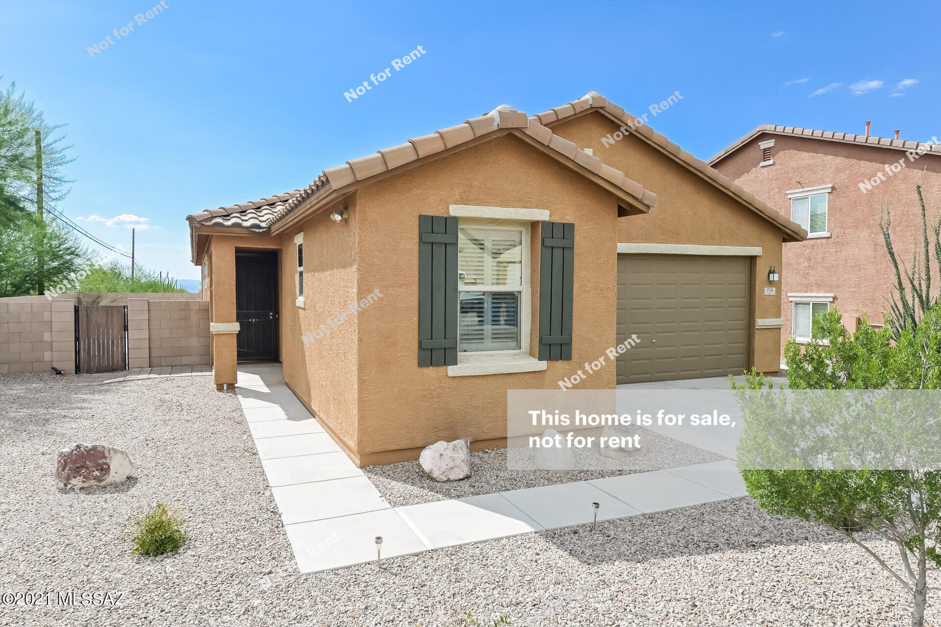 Built in 2014, this Vail one-story home offers granite countertops, and a two-car garage.