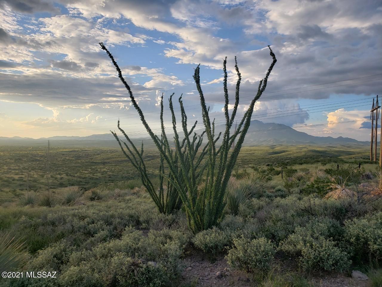 The breathtaking views abound on this 1.23 acre hilltop lot on a paved road in J-Six.  Property backs up to state land for your outdoor activities, which also limits the number of neighbors bordering your property.  Enjoy these gorgeous views every day from your future dream home!