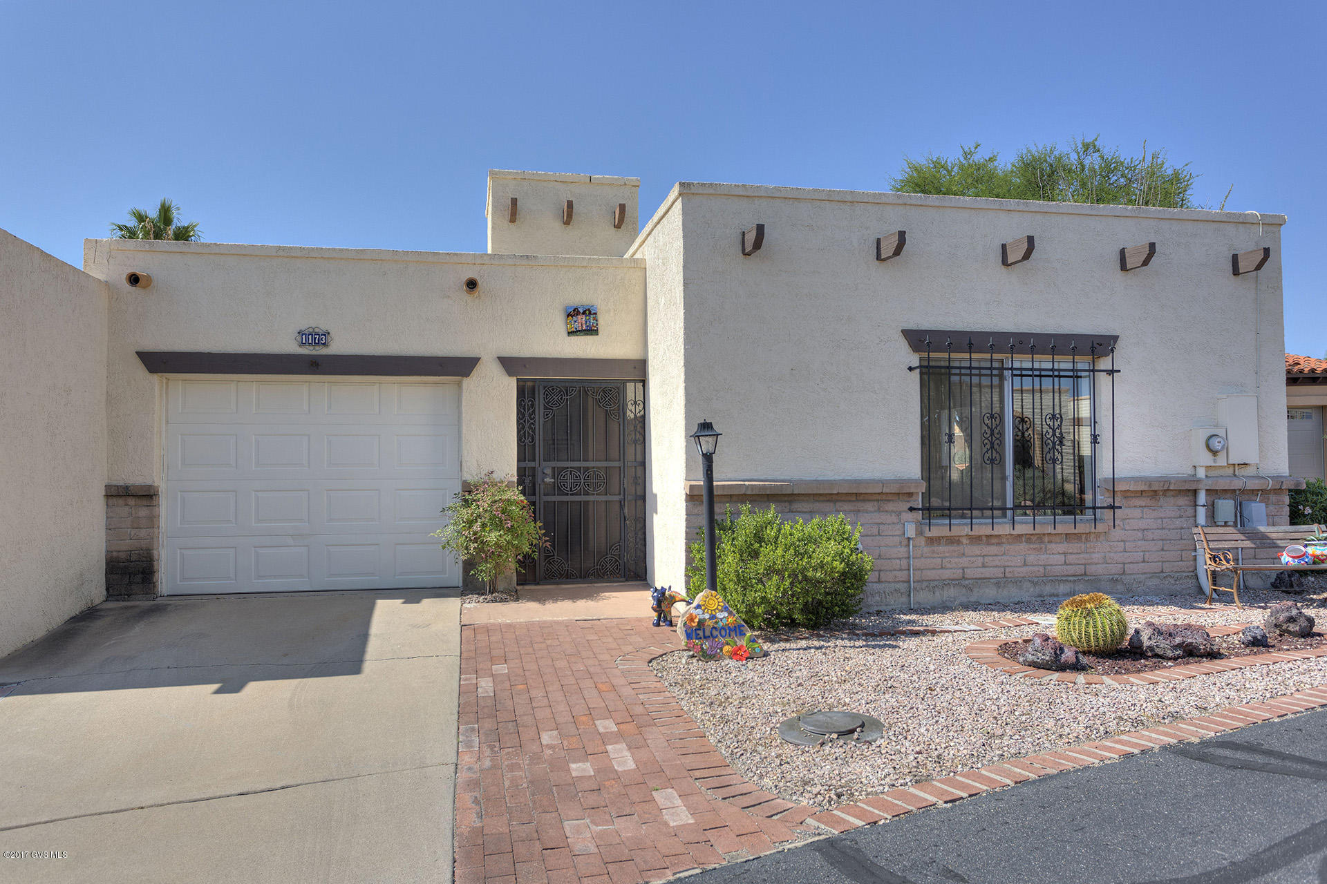 BEAUTIFUL LOCATION; MOUNTAIN VIEWS FROM YOUR BACK YARD W/GORGEOUS SPARKLING POOL! Enjoy this Gem in the Desert. Upgrades for beauty & comfort. New Tile throughout, Fresh paint, Upgraded New Bathroom Vanities, New Lighting, Fans & Sconces. Enter through the Foyer into Great Room Open to Kitchen with Stainless Appliances Included. Granite Counters & plenty of cabinet storage. Beautiful Back Splash added
 Master Suite w/vanity, walkin closet.
 Arizona Room is Awesome & Perfect Room for Entertaining or just Relaxing in comfort around your Cool Pool w/Solar. Pool completely updated, New Variable Speed Pump, Filter & New Cover. Pool equipment stored in shed. New Water Softener & Hot Water Heater installed. Garage has a storage area. This home is a *Must See Ready for Your Season of Enjoyment