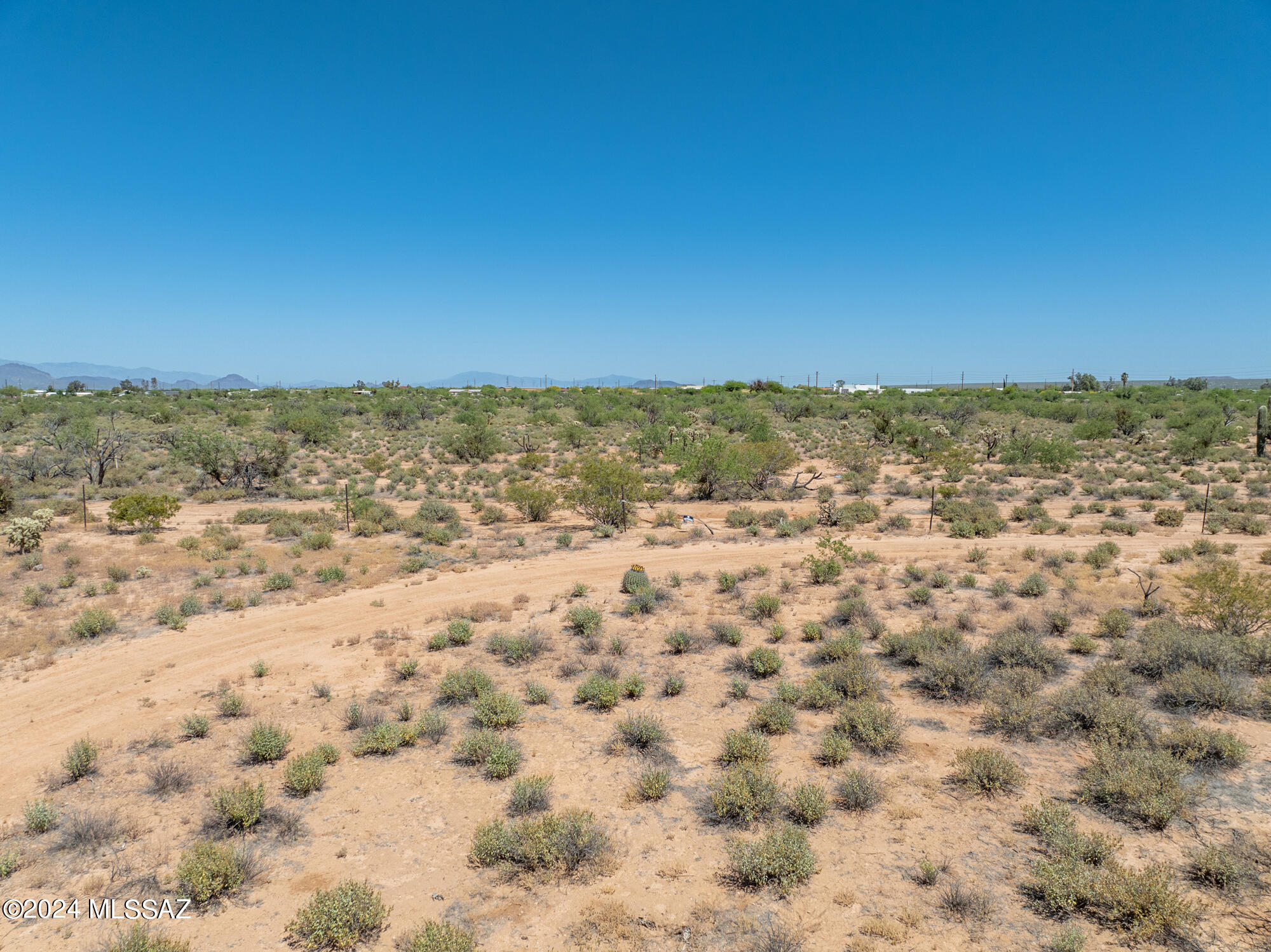 1 acre in Three Points, AZ with seller financing available! GR1 zoning allows livestock, manufactured homes, and more. Located in Flood Zone X (no flood insurance required) with a 30-ft recorded easement and easy access off Ajo Highway. Peaceful desert setting with stunning mountain views. No HOA! Seller will carry with $12,000 down and $400/month. Clayton Homes can finance the entire package, including land, site prep, utilities, and a brand-new manufactured home—turnkey ready. Ideal for homesteading, rural living, or investment. Adjoining 1-acre lot also available for a full 2-acre setup!