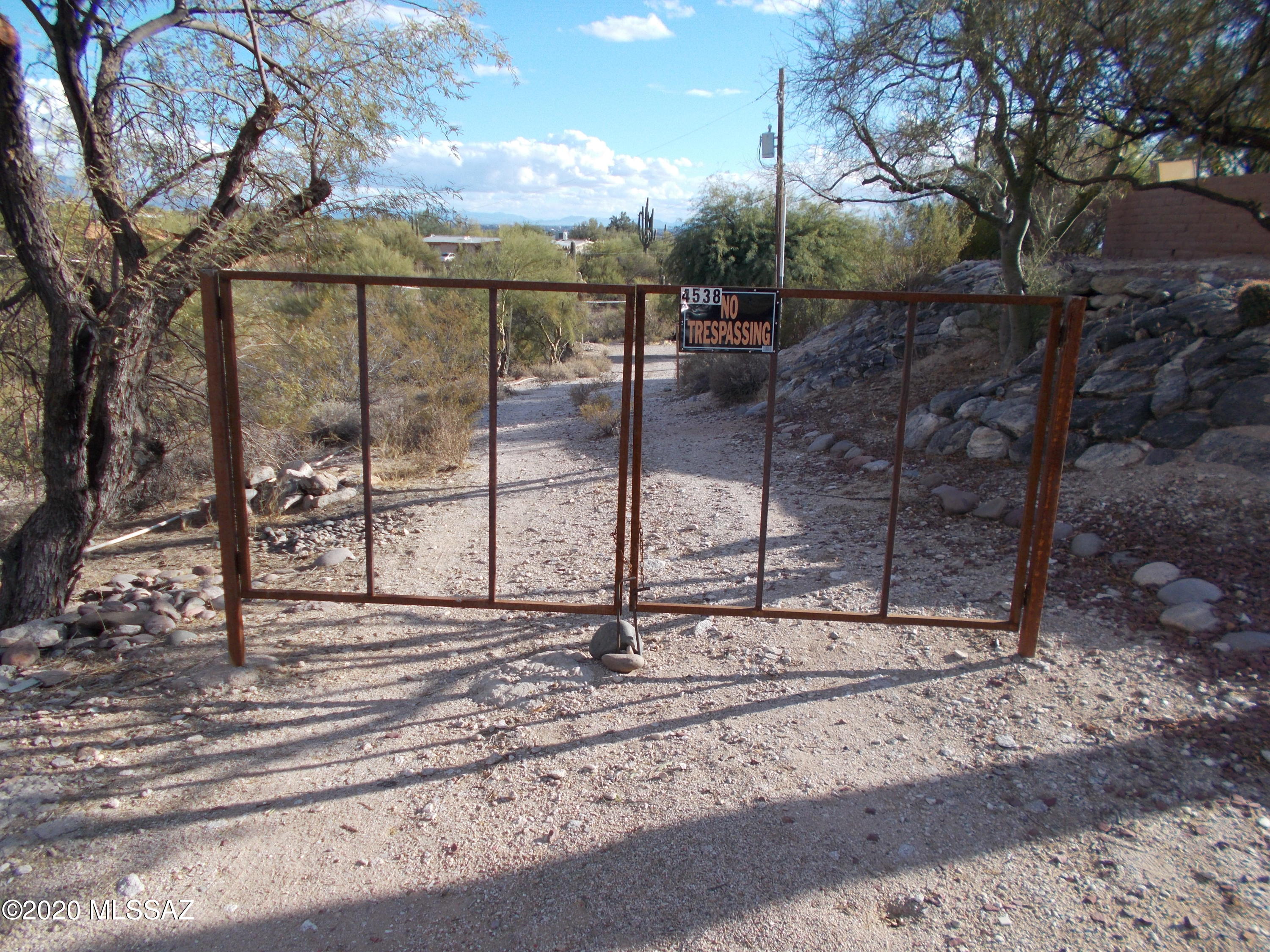 A RARE FIND. Very Affordable, central, Foothills lot with BIG CATALINA MOUNTAIN and TUCSON VALLEY Views. An easement has been created for the neighboring home's leach line encroachment. See 'Documents' section for pertinent information, perc test, survey, etc. Plenty of room to build on this GENTLY SLOPED acre lot. You'll love the easy access to FOOTHILL'S AMENITIES as well as the U of A and DOWNTOWN TUCSON. All utilities in the road, septic required with perc test previously done.  Also ask about excellent Lot Loan Financing from local lenders. At only $131,900, take your clients out NOW to view.