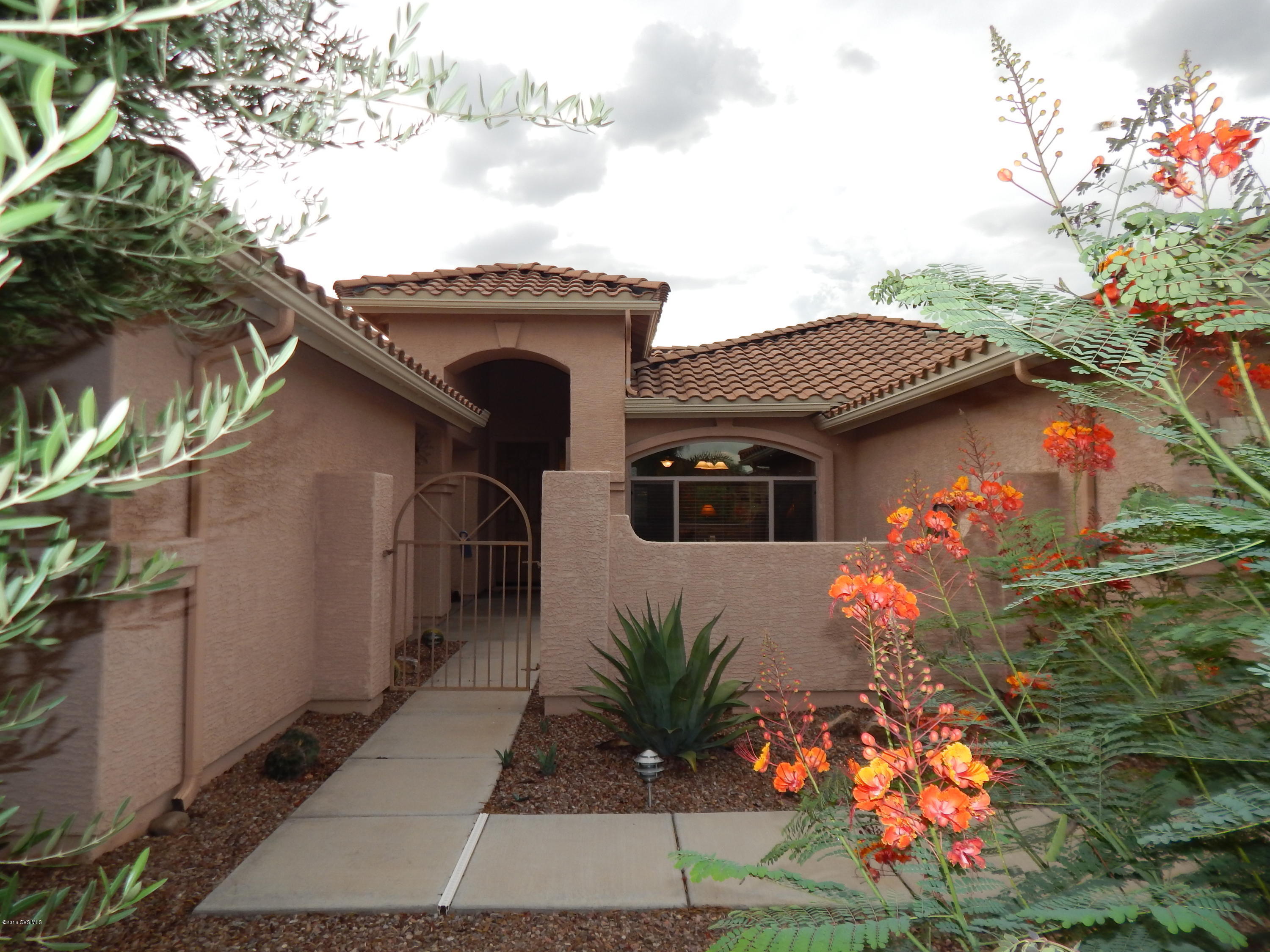 Spacious floor plan with a casita for your guests. Located close to Club House, Grill, Pool, Tennis Courts and Driving Range. 
 Featured are 2 Bay windows, Plantation Shutters, Ceiling Fans, Den and extended garage.
 Easy care landscaping and covered patio for entertaining. Priced to sell. Easy show.