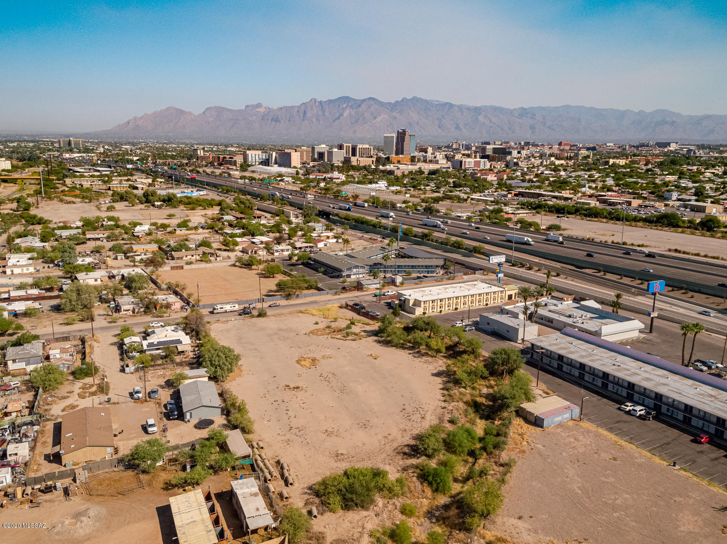 Large vacant R-2 parcel just south of downtown Tucson. Easy access to the Santa Cruz River riparian restoration area and The Loop path. Proximity to the new Caterpillar offices, Mercado, MSA Annex shopping area. From the Cushing Street Modern Streetcar stop ride into downtown, 4th Ave, and UA.  Contact us for an easy show and please visit our website for more info!