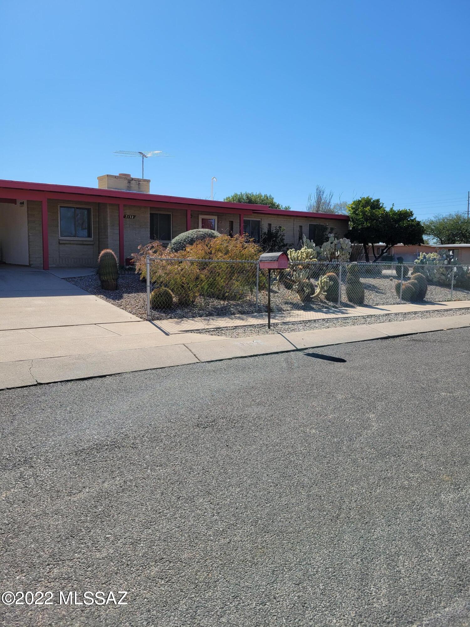 This charming, 4 bedroom house on a large corner lot is waiting for you.  Plenty of storage and unique, hard-surface flooring are just the beginning!  The pool-sized backyard is ready for all your outdoor activities.  With no HOA and tons of parking, there's room for all your toys. Newer AC and the roof was recently recoated. Your new saguaro, cacti, roses, and citrus await you!  Sellers are related to listing agent.