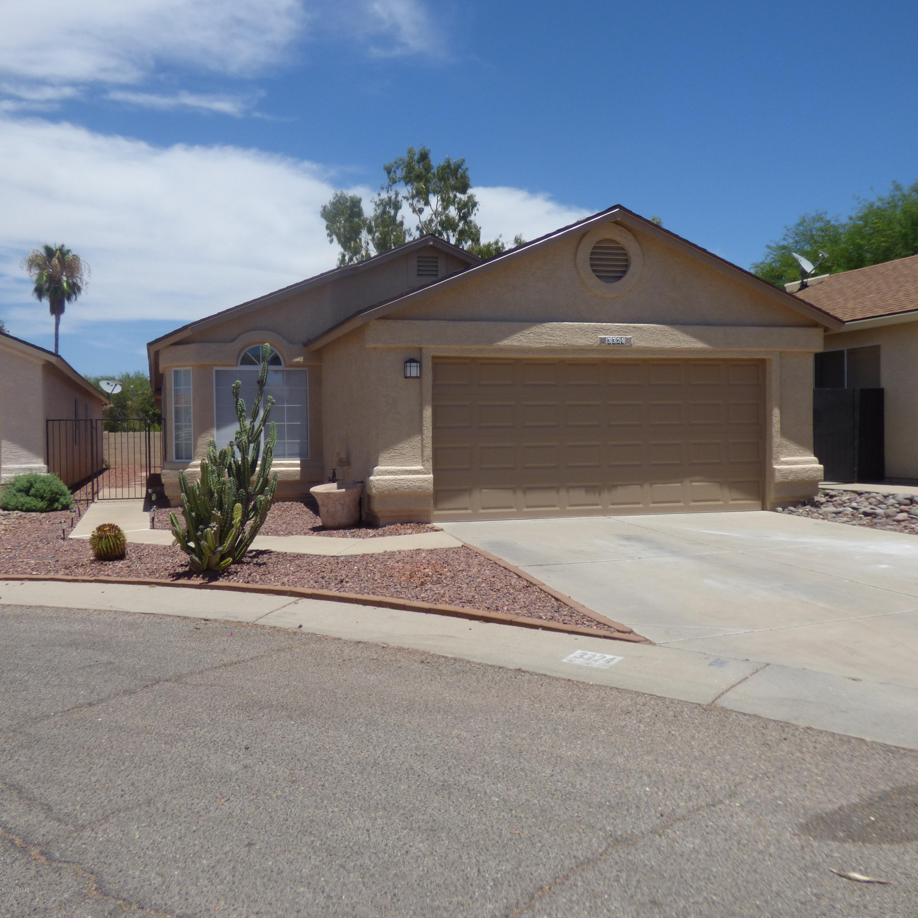 Great NW area with 3 bedrooms/2 baths, ceramic tile and laminate wood flooring. Covered patio, low care landscaping, community pool/spa and park, and in quiet cul-de-sac location. Call today for a showing!
