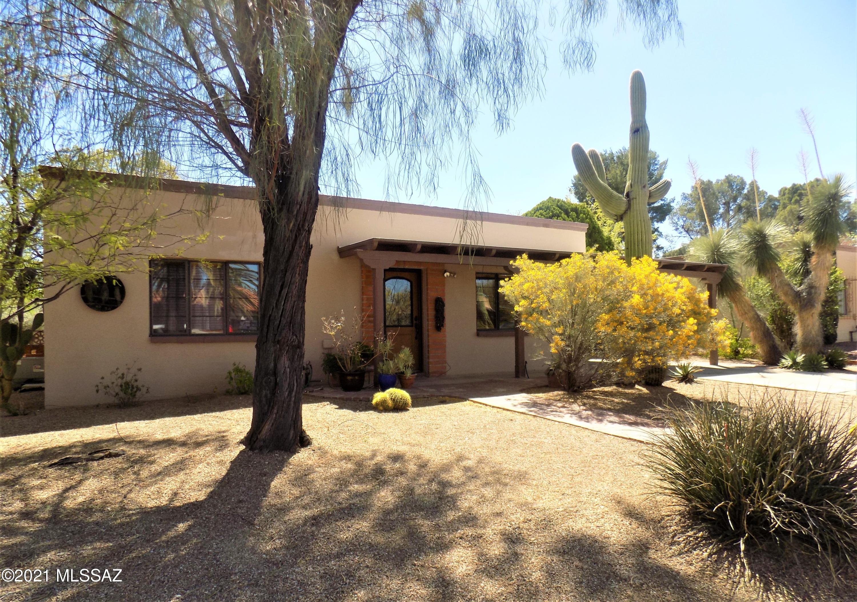 2 Bedroom 1 Bath, 972 sqft close to everything. 
You'll love the warm mexican tile through much of the home, the stainless appliances with gorgeous Verona dual fuel double oven, water softener and on demand tankless hot water heater. If you are looking for more space, how about a bonus room, screened sun porch and laundry room filled with storage, none of which are included in the square footage (adds approx 300 sqft). Outside in your very own enchanted garden you can enjoy sunrise over the Santa Rita mountains, the many mature shade trees and large patio perfect for entertaining. If you have been looking for an opportunity to enjoy fabulous indoor/outdoor living in the heart of Green Valley, Welcome Home!