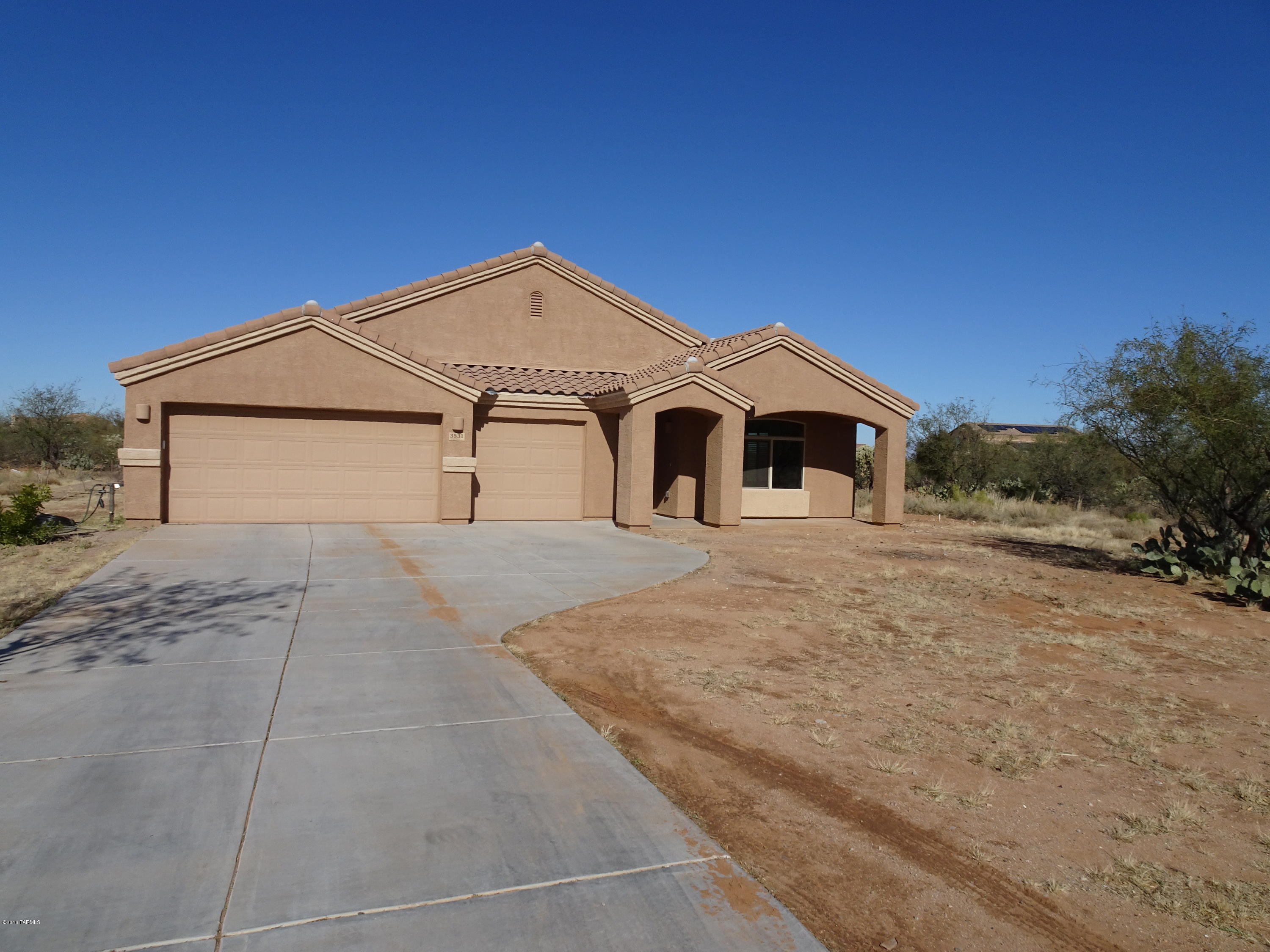 This Sahuarita Highlands, 4 bed, 2 bath, home for rent is a wonderful place to live. Maximum privacy with no neighbors to the east, & distant neighbors to the south & west. As you enter through the front door, you will see the formal dining & living area.  Lots of counter space in the kitchen with an island. Sleek, black, all-electric appliances. With a dining area just off the kitchen, you’ll have loads of space to entertain friends or family. You'll love the big, walk-in pantry for oodles of storage. With a 3 car garage, you have enough room for a couple of cars plus extra storage. Enjoy the view of the mountains from the front porch. Tons of storage is in the hall closets; one of them is even a walk-in! Perfect for holding extra sheets & towels, or plenty of board games. Welcome Home.
