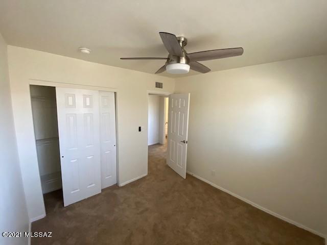 Newly remodeled Two Story, 3 BR/2BA Town home is ready for your move in. Living room, Kitchen, dining area and half bath downstairs. Upstairs, each BR has a lighted ceiling fan and dual pane windows. Newer carpet, new SS appliances, W/D, AC, & security front door. Patio French doors to your private, secluded backyard. A quiet, central location with community rec center and community pool. Plenty of parking on/off street including one covered space. Convenient shopping, DMAFB, and UA.  Tenant will be billed additional $100/month for water/sewer. Owner is Licensed Real Estate Agent in Arizona.