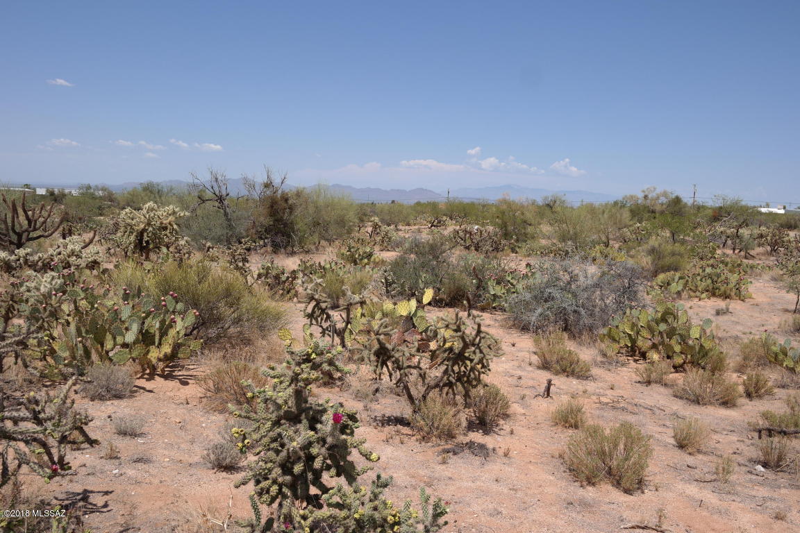 Perfect site for your dream home in Sierrita ranch! 9.85 acres of panoramic wildlife views. Paved streets within 500 feet of property entrance.