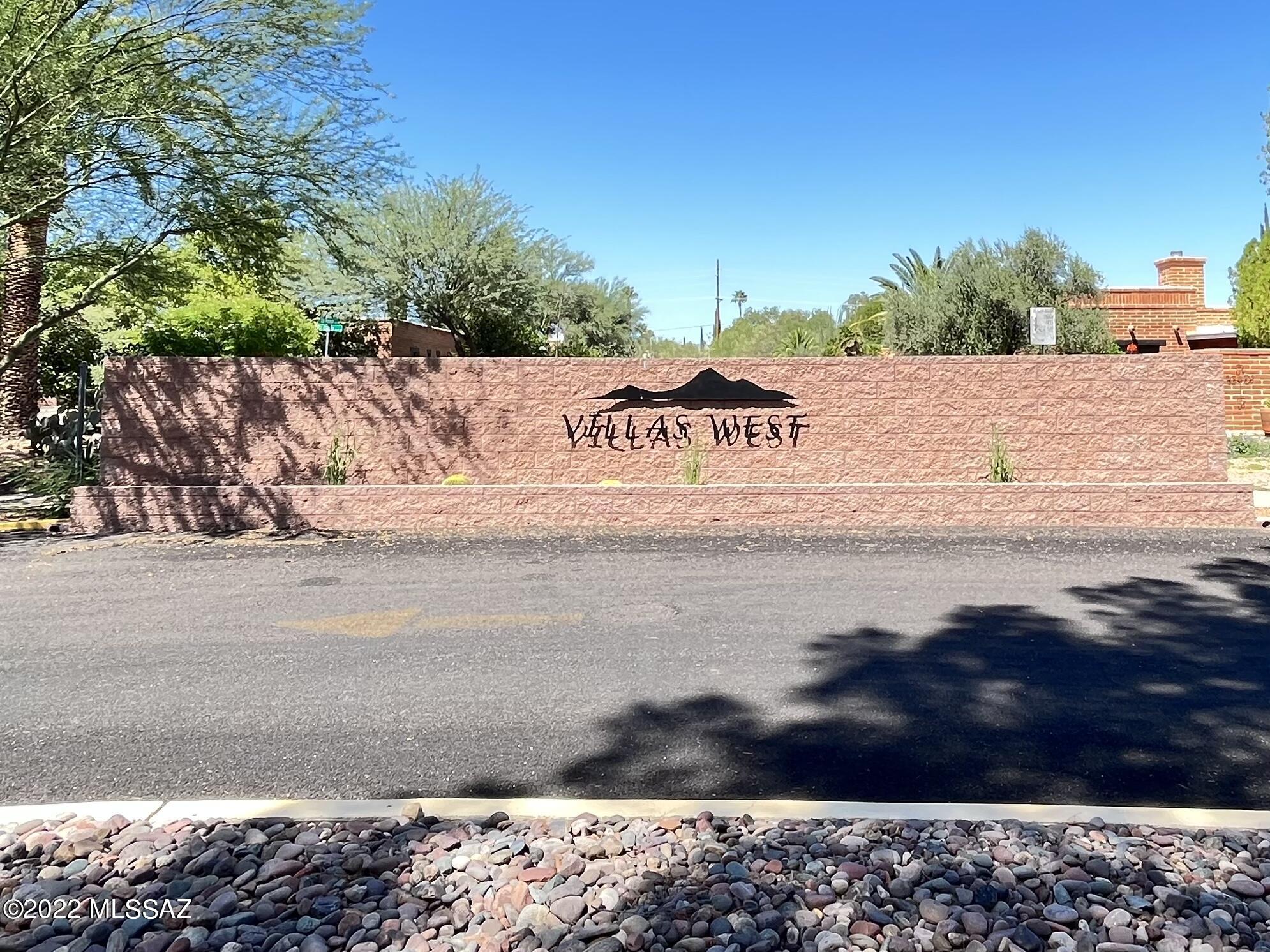 This is the perfect turn-key, furnished villa you have been looking for!*NO GVR*Neutral tile throughout the villa, NO CARPET! Modern kitchen w/ white cabinets, microwave, & dishwasher. The 2nd bedroom is perfect for guests, office or hobbies or TV room. Upgraded bathroom w/ linen closet & built-in hamper. You will love the extra storage space in the hall closet or the cleverly disguised narrow pantry & utility closets in the bedroom. The front patio has been tiled & paved and the back patio offers a secluded feel among the greenery, perfect for AZ living. This villa offers a washer & dryer in the utility room plus storage area. HOA covers common areas, water, trash, the exterior of the condo, hot water heater, roof, heating/cooling, termite treatment... Come fall in love w/ your new villa!