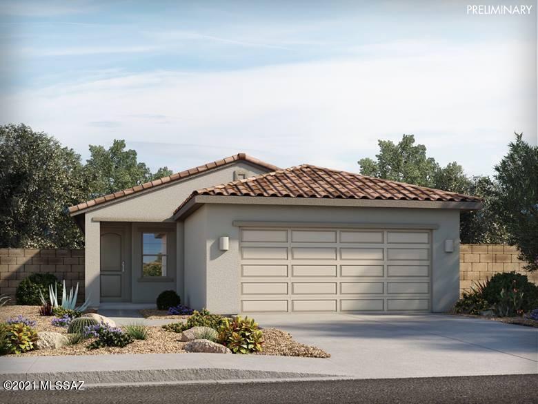 Brand NEW energy-efficient home ready January 2022! Invite friends and family over for parties in the great room adjacent to the kitchen with island. Espresso cabinets with shaded grey granite countertops, blended stone tile flooring with multi-tone carpet in our Elemental package. Las Patrias offers convenient access to employment centers and downtown Tucson. This family-friendly community features several amenities such as bike trails, playgrounds, and walking trails. Known for their energy-efficient features, our homes help you live a healthier and quieter lifestyle while saving you thousands on your utility bills.